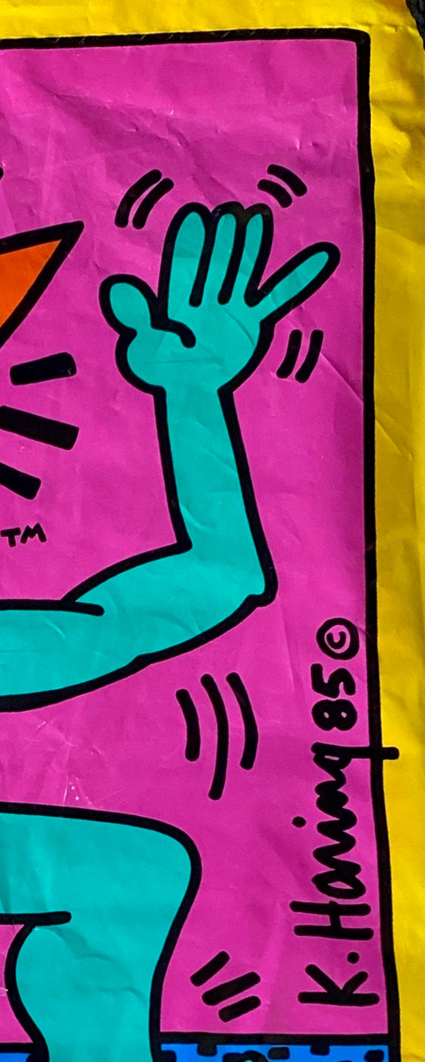 Keith Haring Pop Shop, c.1986:
Vintage original 1980s Pop Shop bag designed & illustrated by Keith Haring. Features a bold 1985 Keith Haring printed signature and standout original Pop shop logos, plus bright lush colors which make for a unique