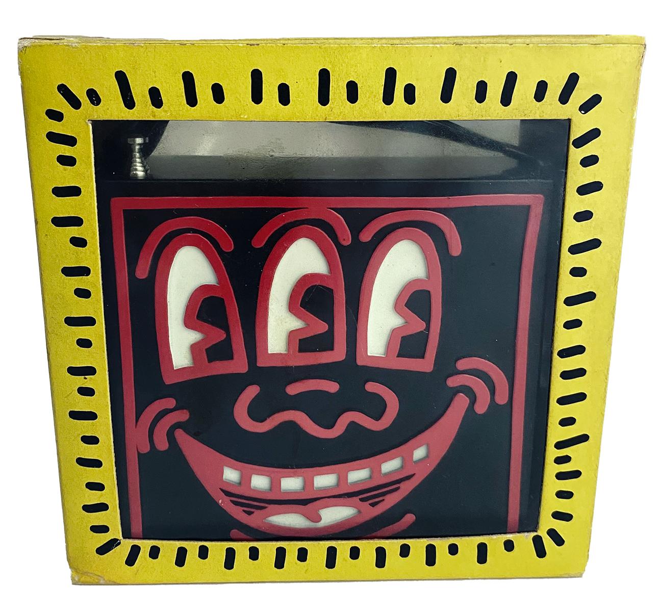 Keith Haring Pop Shop 1986:
A very well preserved Keith Haring Pop Shop radio accompanied by its original packaging. Sold at the Pop Shop in New York c. 1985. Features a bold Keith Haring printed signature on box and a molded signature on radio.
