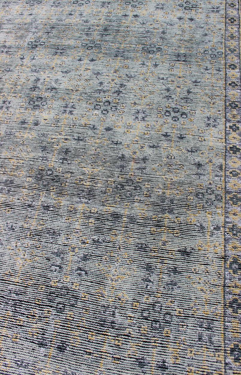  Distressed Modern rug, Hand-Woven Area Rug in Lt Sage, Gray and Yellow by Keivan Woven Arts. Country of Origin: India; Type: Modern; Design; All-Over, Abstract-Floral; Keivan Woven Arts; rug KHN-1021-ARI-27 

Measures; 8'1 x 11'2 

This Indian