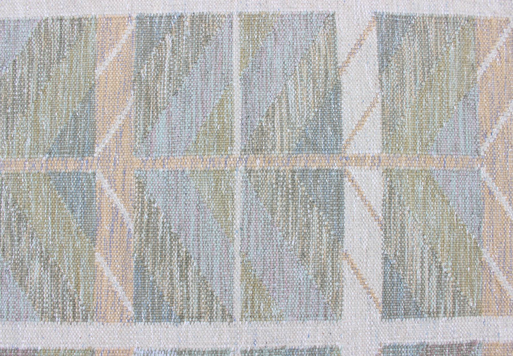 Keivan Woven Arts Scandinavian Flat-Weave Design Rug with Green, Gray, and Peach. Keivan Woven Arts / rug RJK-24598, country of origin / type: India / Scandinavian flat-weave.
Measures: 9'1 x 12'0 
This Scandinavian flat-weave is inspired by the