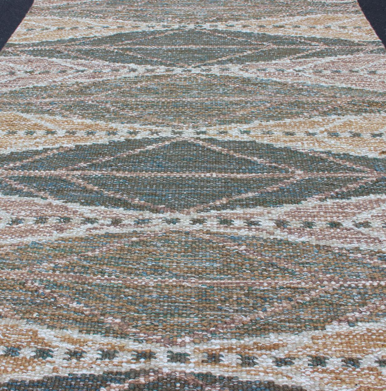 Keivan Woven Arts Scandinavian Flat-Weave Rug With Modern Design Brown and Green. Keivan Woven Arts / Rug/RJK-23326-SHB-010-G. 21st Century.
Measures: 3'2 x 4'11 
This Scandinavian flat-weave rug is inspired by the work of Swedish textile designers