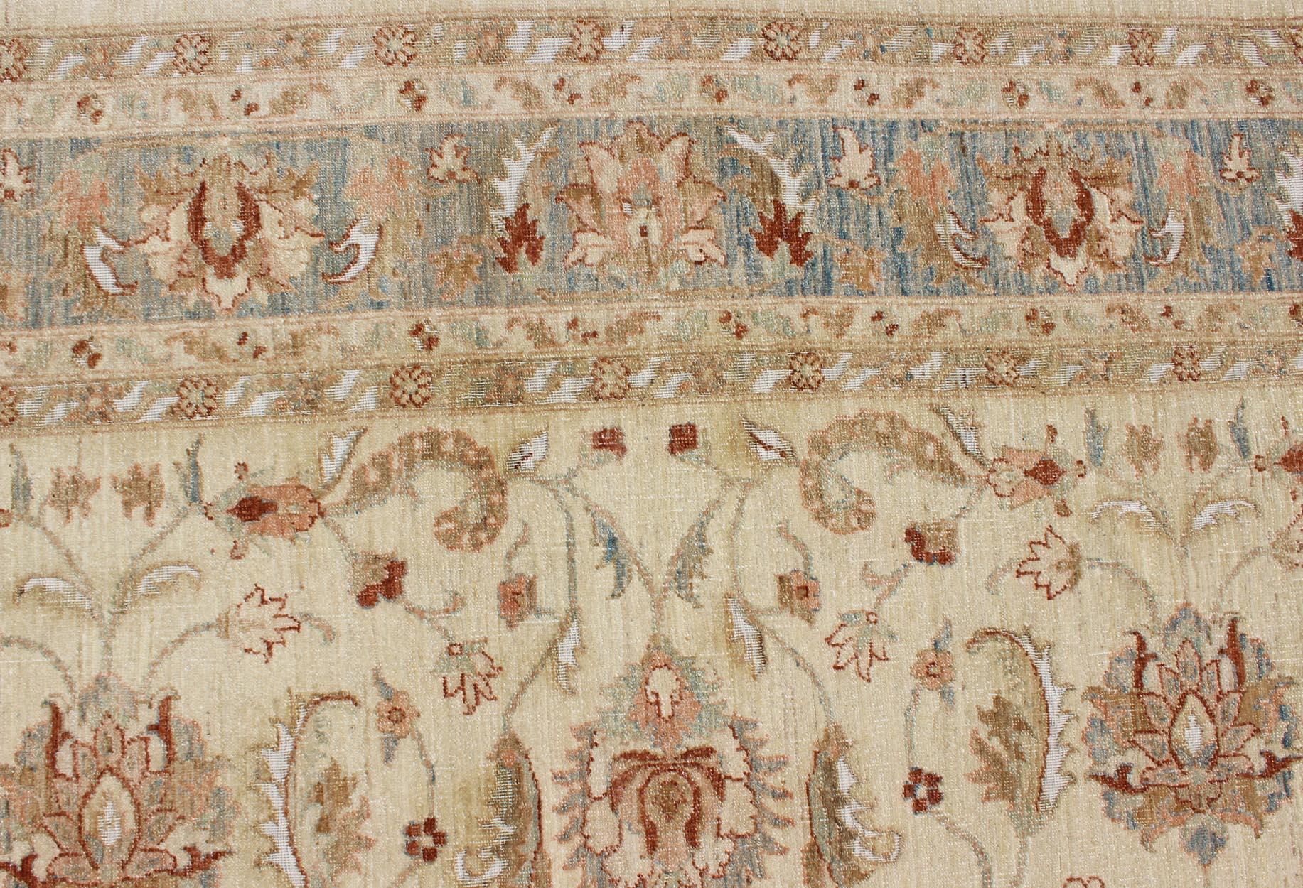 Keivan Woven Arts Vintage Cream Sultanabad Rug With Pops of Blue and Red In Good Condition For Sale In Atlanta, GA
