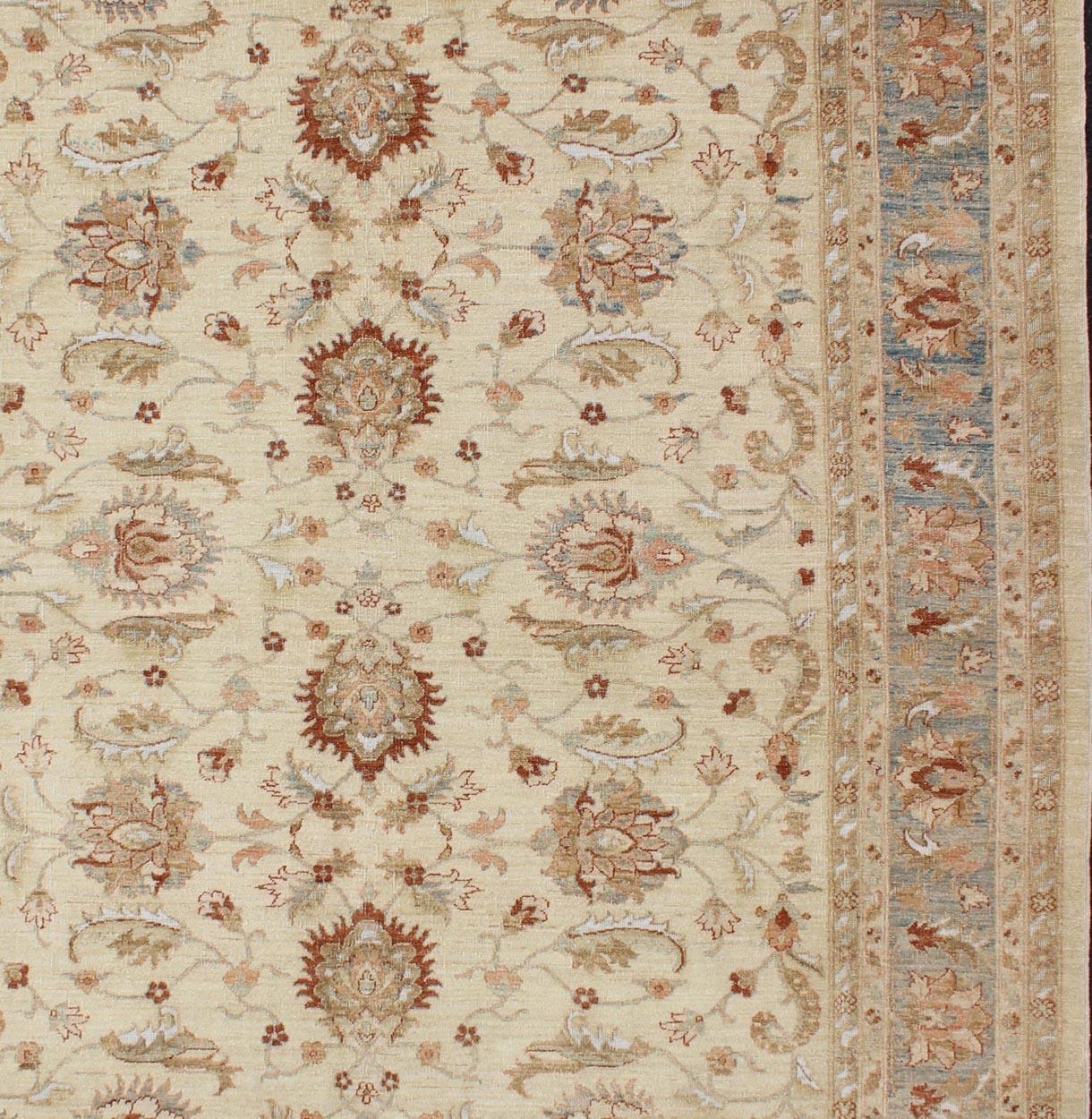 Keivan Woven Arts Vintage Cream Sultanabad Rug With Pops of Blue and Red For Sale 1