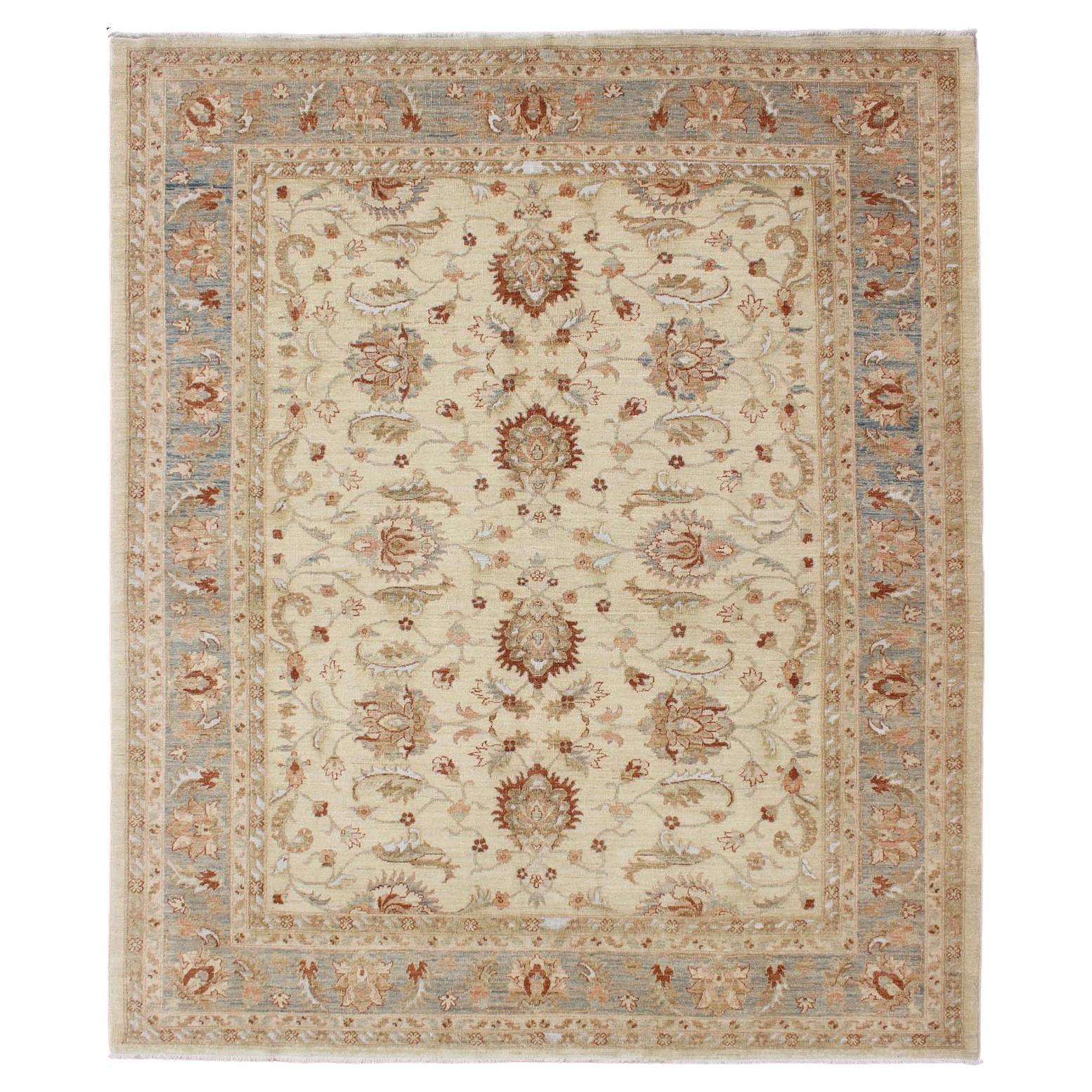 Keivan Woven Arts Vintage Cream Sultanabad Rug With Pops of Blue and Red For Sale
