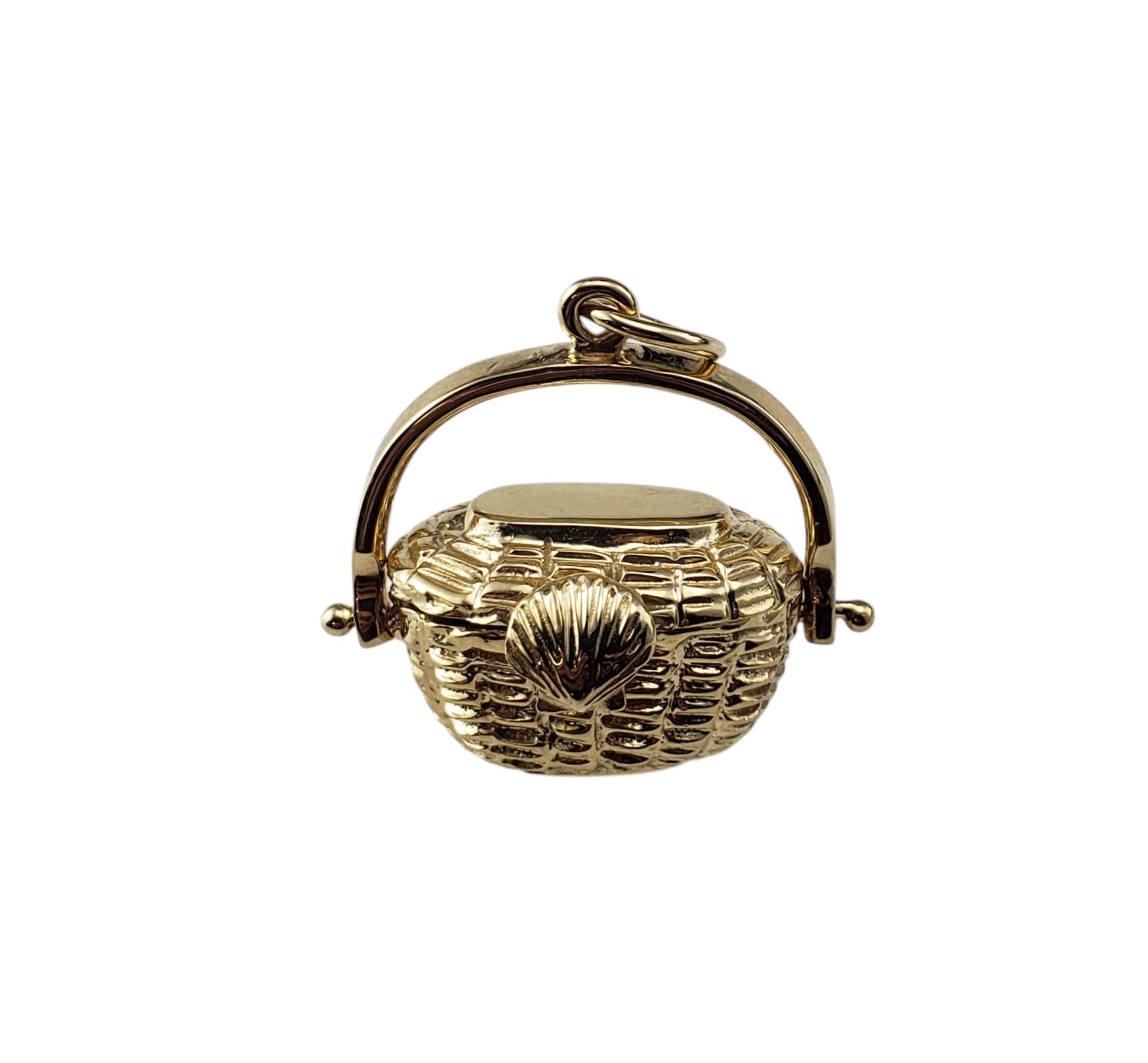 Kelli K 14K Yellow Gold Nantucket Basket Charm-

This lovely 3D charm pays homage to the traditional Nantucket lightship baskets. Crafted from 14K yellow gold, it features a hinged lid and distinctive shell clasp, adding a nautical touch that