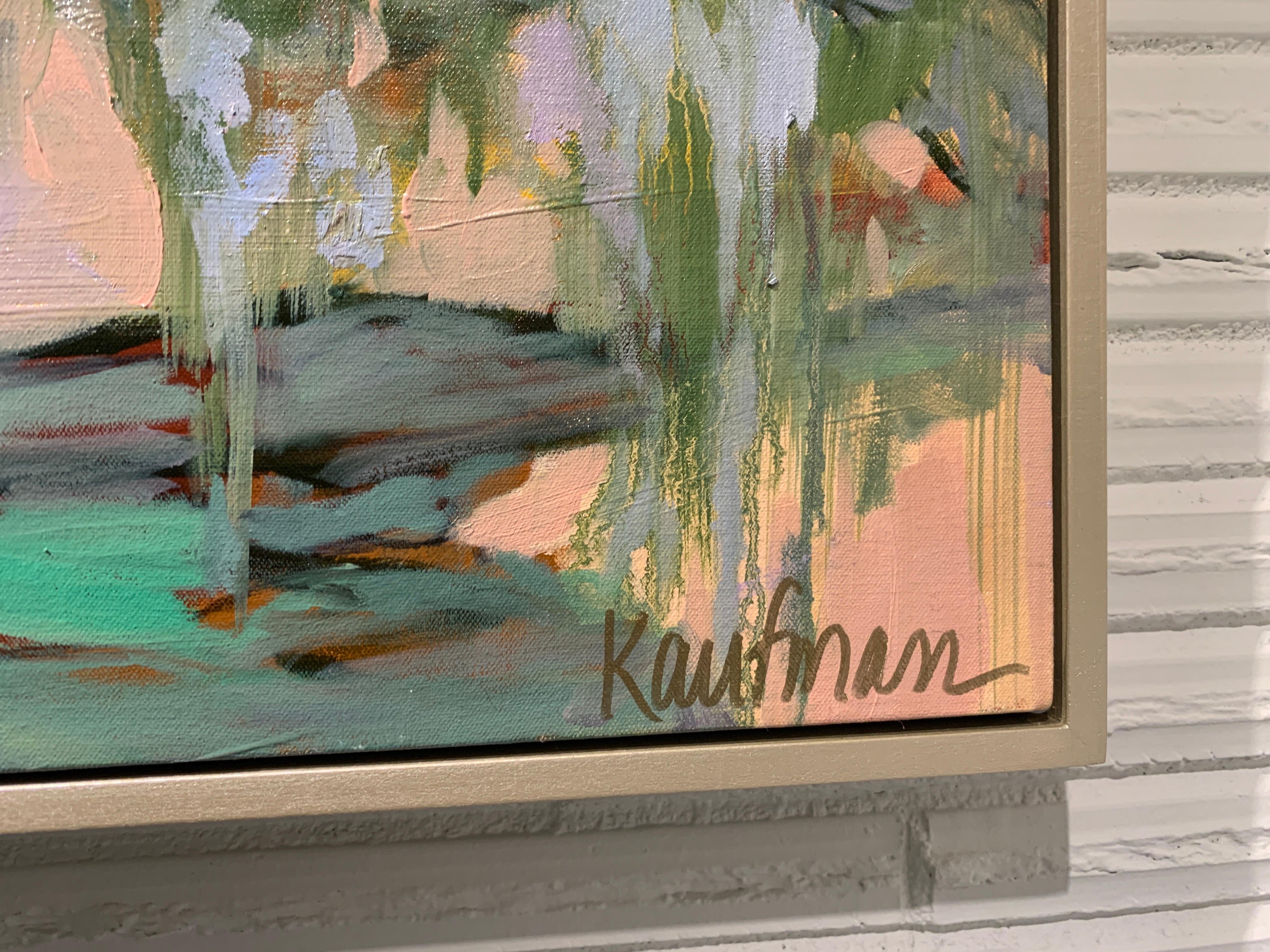 'Tree of Life' is a large horizontal contemporary oil and wax on canvas landscape painting set inside a frame, created by American artist Kelli Kaufman in 2021. Featuring an exquisite palette made of a lovely tonality of brown, blue grey, pink,