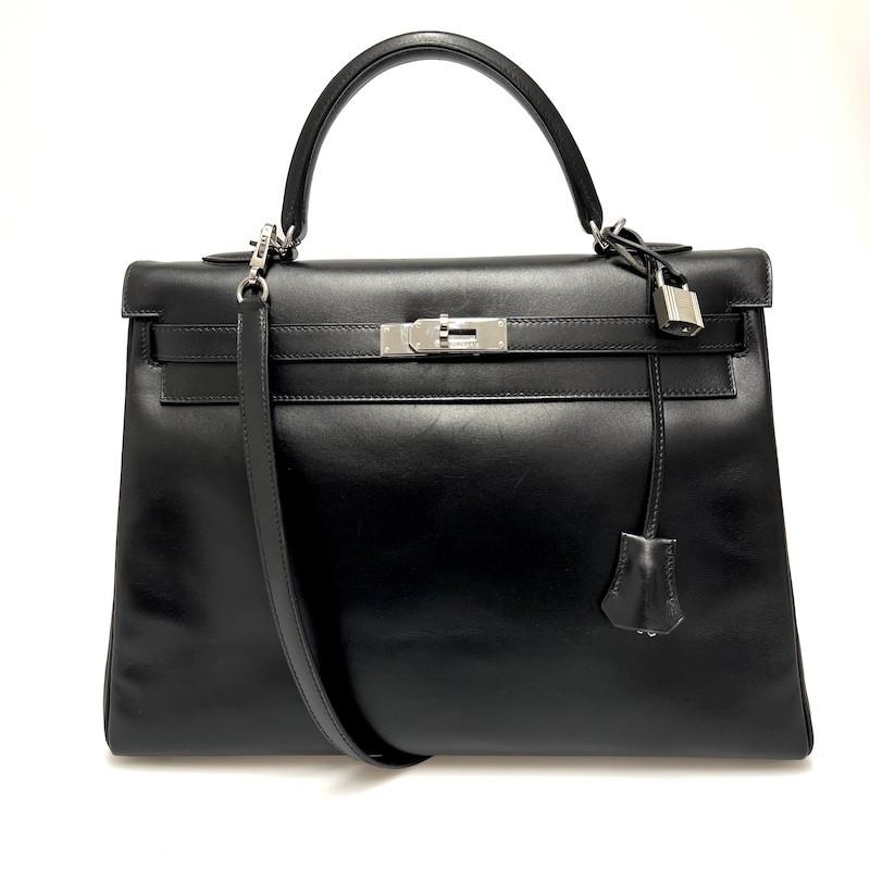 Wonderful Hermès Kelly 35 box handbag

Condition : very good
Made in France
Model : Kelly 35
Material : smooth box leather
Interior : smooth black leather
Color : black
Dimensions : 35 x 25 x 18 cm
Shoulder strap : yes
Stamp letter : J in a