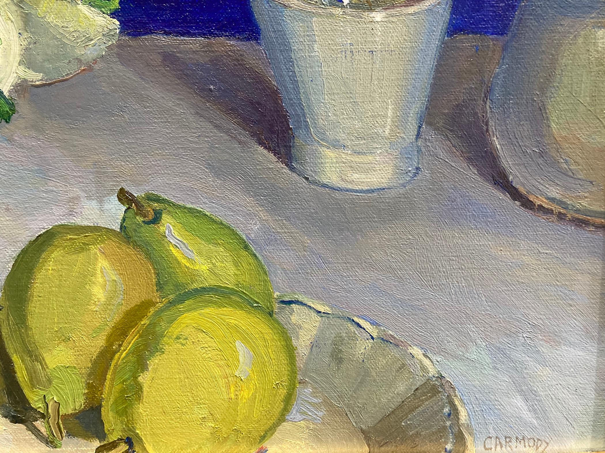 A still life painting of flowers on a table. On a white table, a blue and white pitcher holds white blooms. Around the pitcher on the table are a speckled napkin with a knife laying over the top to the left, a dish of spring green pears in the front