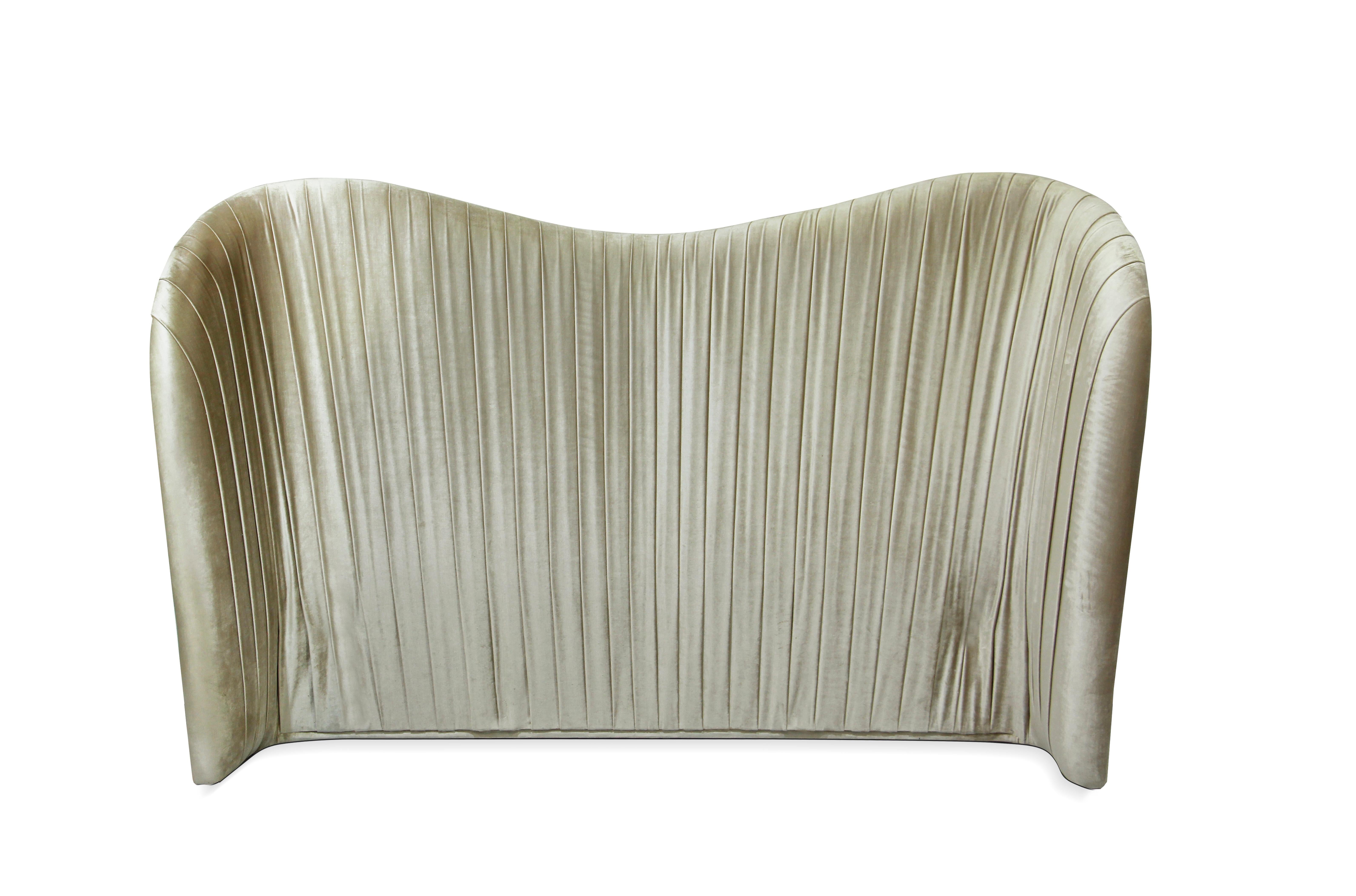 The lux and bodacious Kelly bed is the cool girl sipping Cosmos in the dark corner of a chic NYC lounge. Her fluid curves are harmoniously matched by sumptuous pleated waves of supple velvet upholstery fabric. You'll be dying to get up close and