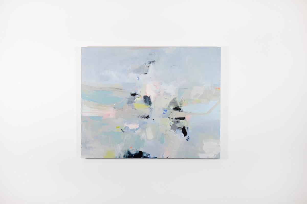 This large abstract statement painting by Kelly Rossetti features a pale blue palette with light yellow, pink, and black accents. The artist layers colors using soft brushwork and creates a balanced abstract composition. The painting is signed by