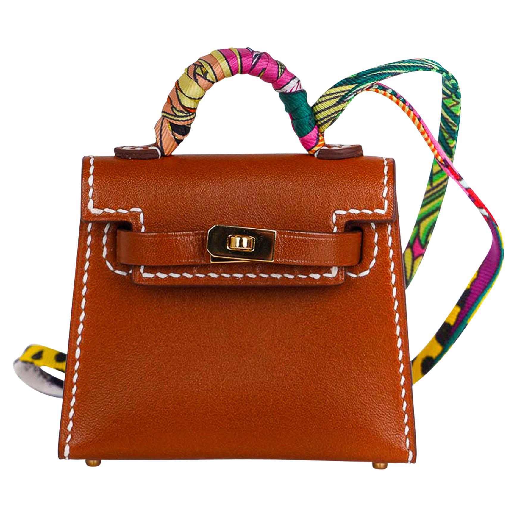 Kelly Twilly - Sac à breloques en tadelakt doré avec quincaillerie dorée, neuf dans sa boîte