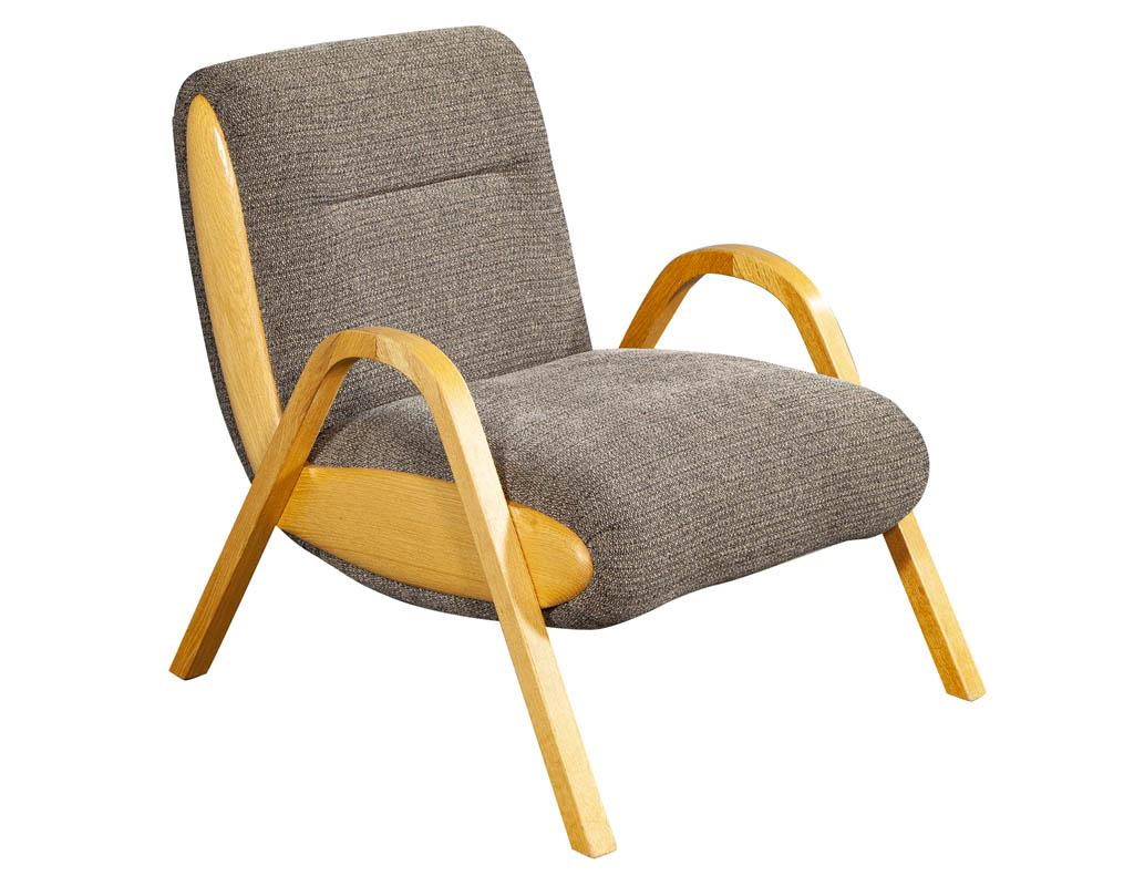 Kelly Wearstler Camden modern lounge chairs. These stunning chairs designed by Kelly Wearstler are perfect for a modern and contemporary home. Chairs feature a stunning show wood and gorgeous neutral fabric.
Price includes complimentary curb side