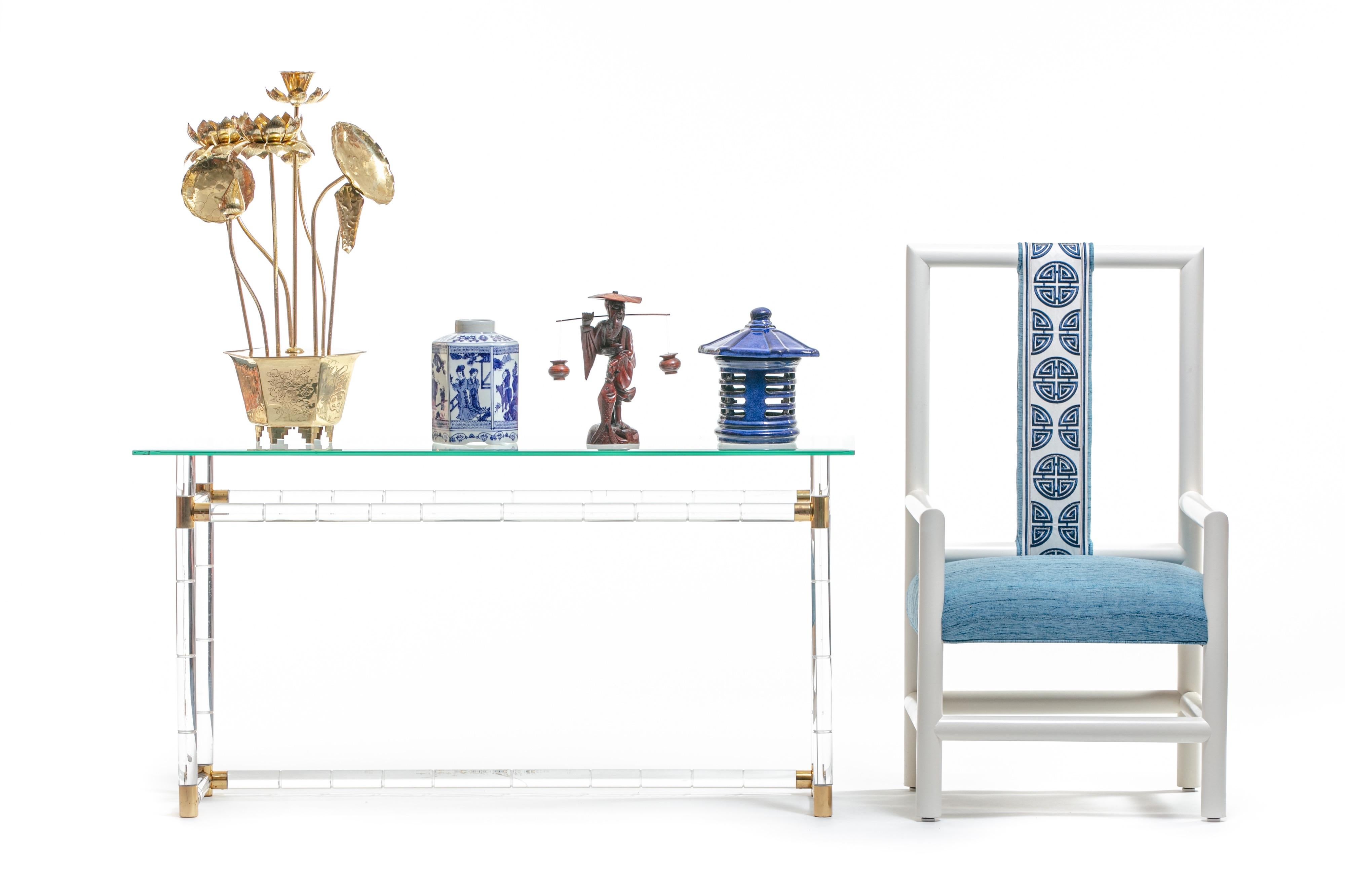This beautiful high back dining or occasional chair was selected by Kelly Wearstler for her Miami project - The Viceroy Hotel - and later featured in Kelly Wearstler's book, HUE. Inspired by Chinese blue and white porcelain, our shop re-imagined