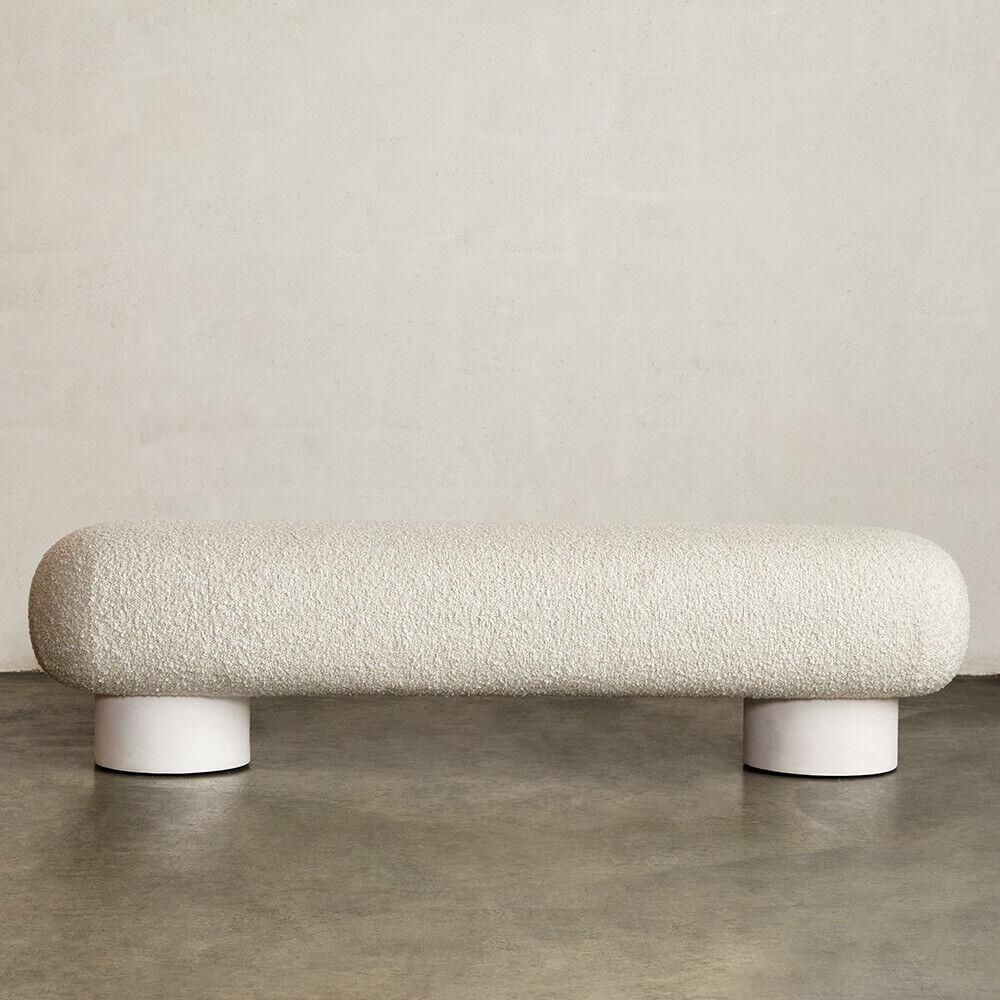 With its monolithic massing and sculptural play on materiality, the Colina Bench is an approachable iteration of modern organic design. This bench is made by a local LA artisan from hand-formed white resin with a plaster-like white finish.
