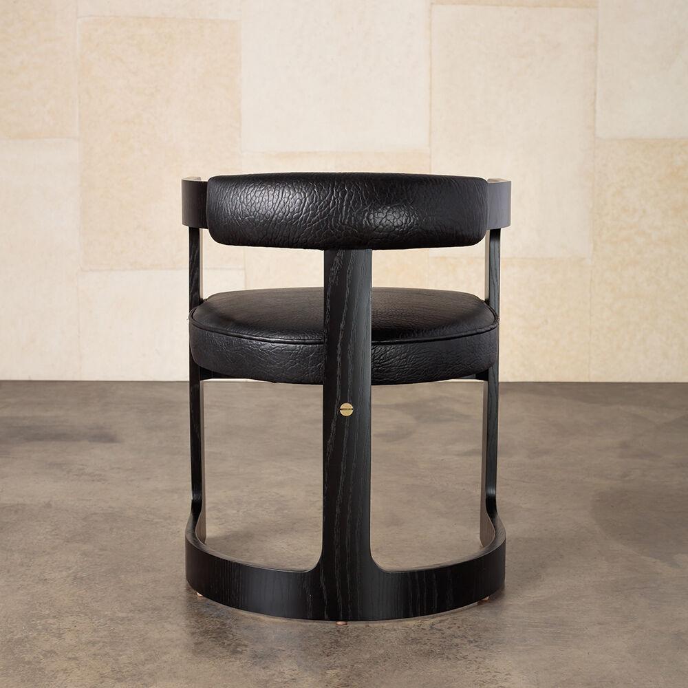 Kelly Wearstler Ebonized Oak Zuma Dining Chair with Curved Back, Black Leather In New Condition For Sale In West Hollywood, CA