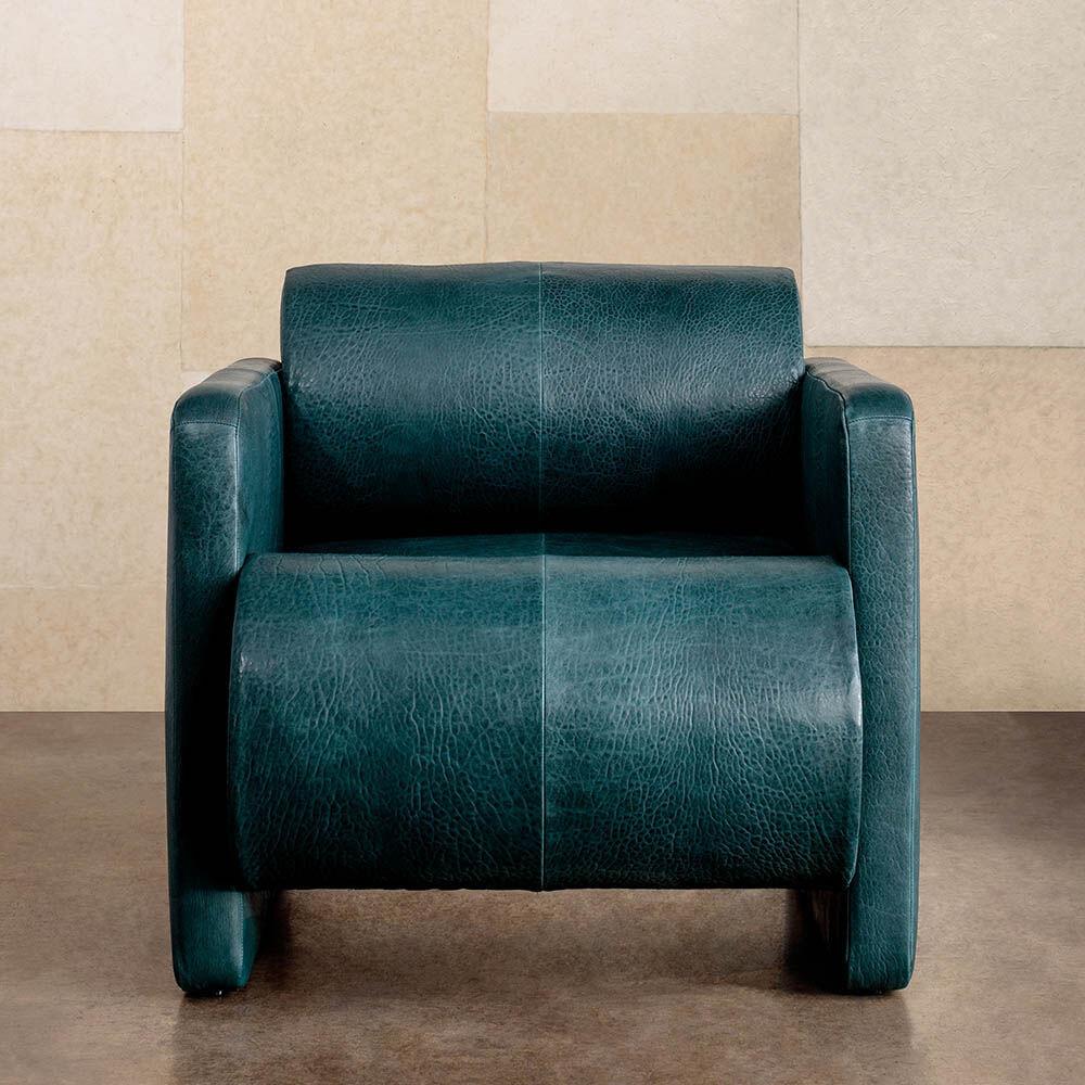 Featuring a visually impactful silhouette, the Esfera club chair establishes an openly modern language of pure geometries and bold massing without compromising comfort. This club chair’s fully-upholstered body is available in a curated selection of