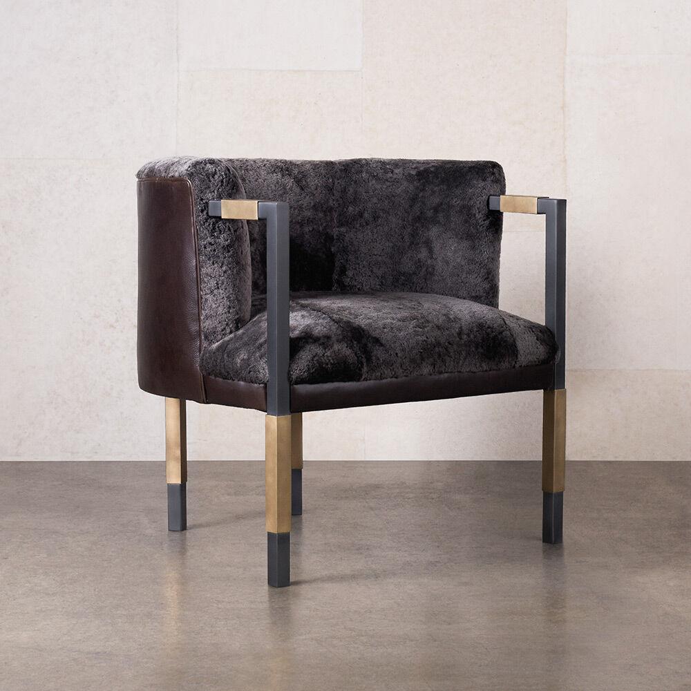 Attaining a seamless coexistence of form and function, the Larchmont Chair derives inspiration from Pre-Modernist architectural styles with particular attention paid to materiality and geometry. This chair features a square profile Stainless Steel