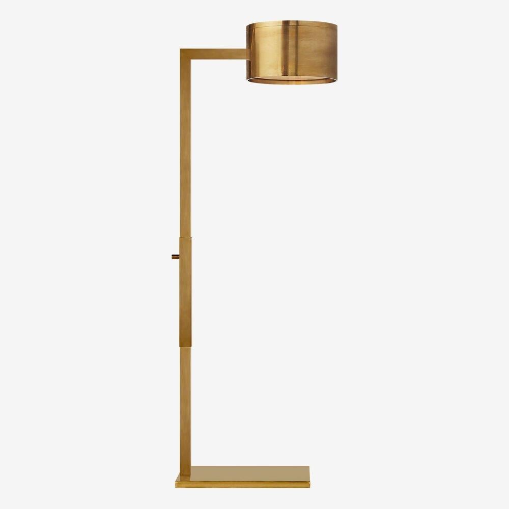 Attaining a seamless coexistence of form and function, the Larchmont Floor Lamp derives inspiration from Pre-Modernist architectural styles with particular attention paid to materiality and geometry. This adjustable pharmacy-style floor lamp is