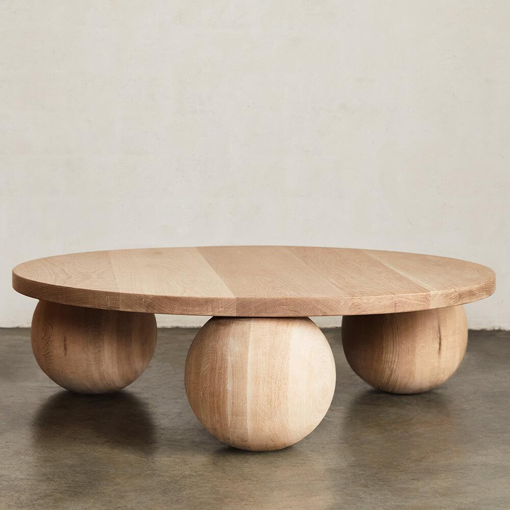Hand-carved from natural oak, the Morro Coffee Table exemplifies modernity through geometric form. Available in Natural, Ebonized, and Bleached White Oak.