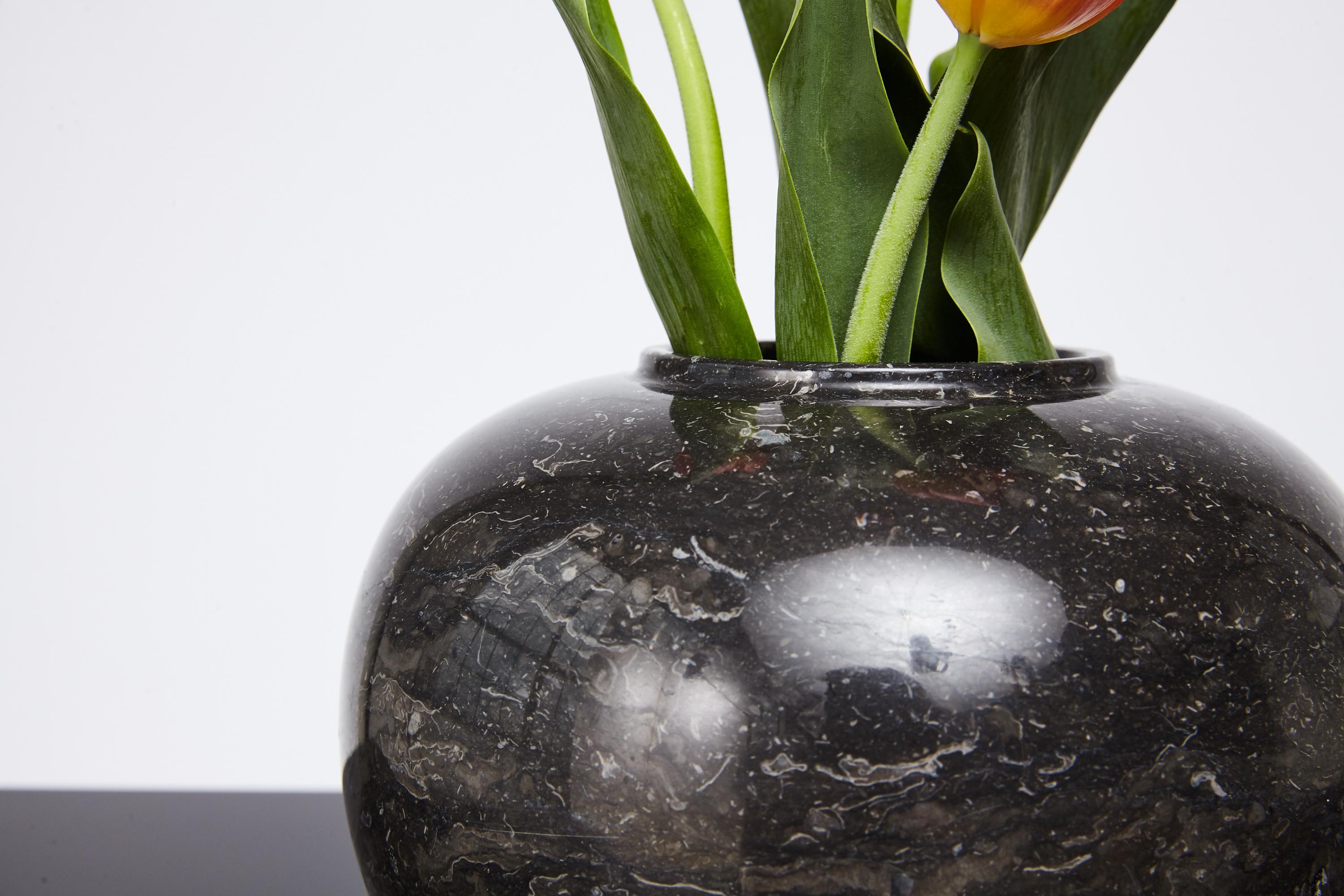 Bulbous marble form vase selected by Interior Designer Kelly Wearstler for her project - The Viceroy Miami. Kelly Wearstler is known to favor interestingly veined marbles and this elegant Zen form vase features gray speckled veins. Part of a