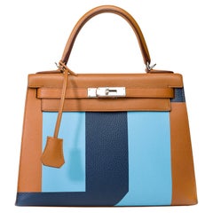 KellyGraphie Hermès Kelly 28 handbag strap in Gold and blue leather, PHW