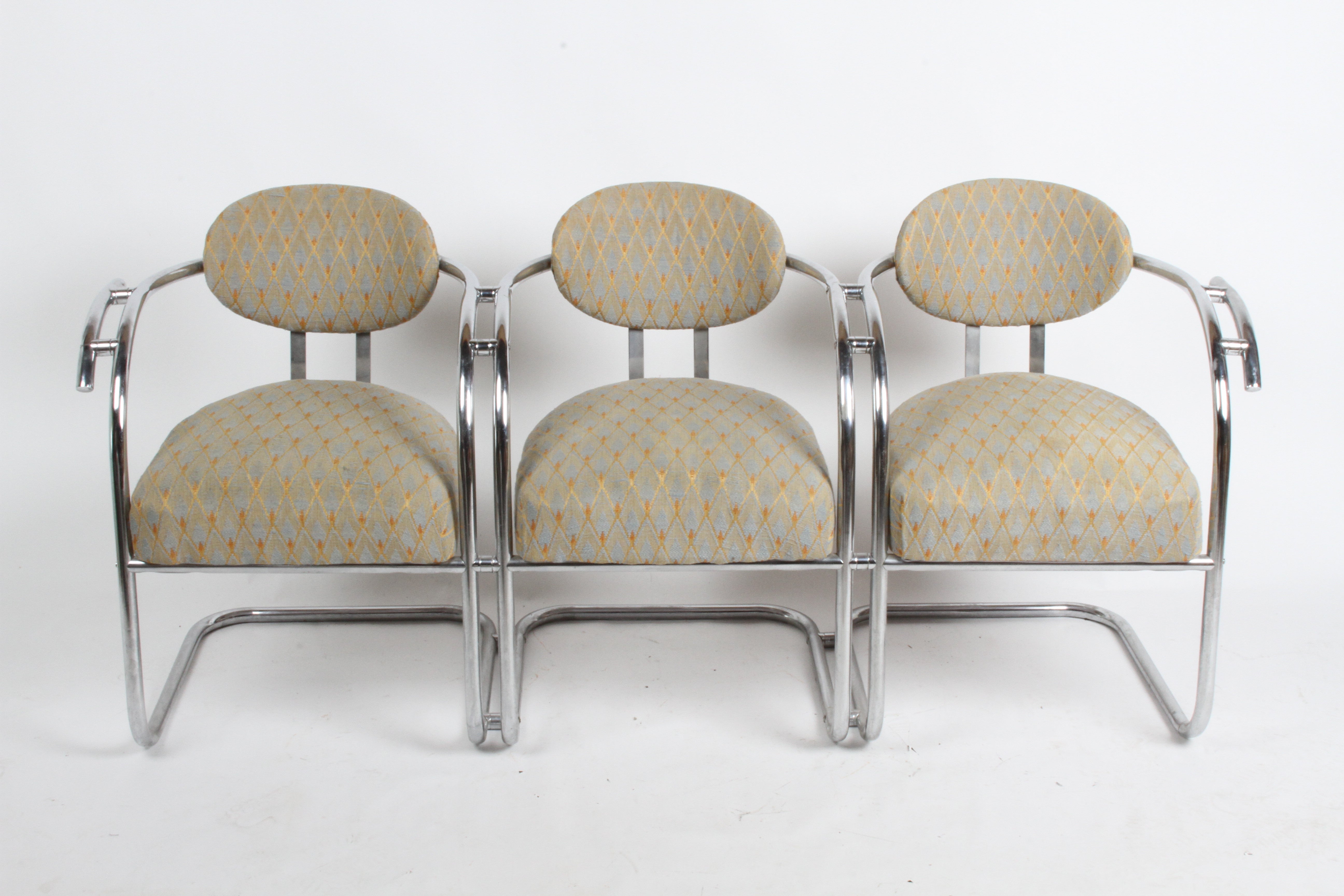 Unique streamline tubular chrome Art Deco tandem 3-seater with arms and upholstered seats and backs, in the style of Kem Weber or Wolfgang Hoffmann for Howell Manufacturing. Older upholstery on springs, chrome in great condition, could use a light