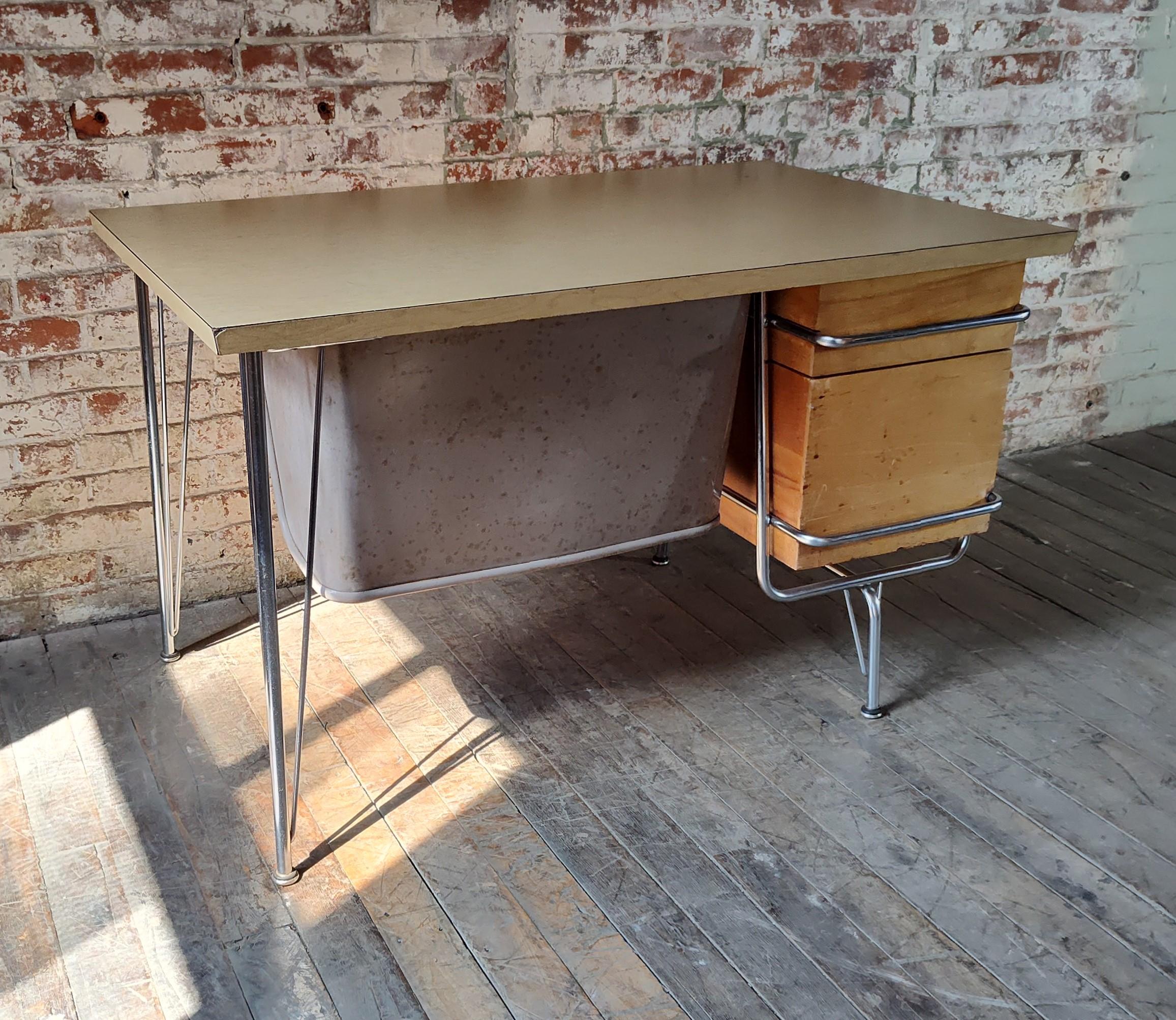 Kem Weber Trimline Desk

Overall Dimensions: 29 3/4″ x 47 3/4″ x 29 1/2″

Pencil Drawer: 17 1/4″ x 22

Upper Drawer: 12 1/2″ x 24 1/2″

Lower Drawer: 12 1/4″ x 24 1/4″

Materials: Maple, Steel & Laminate