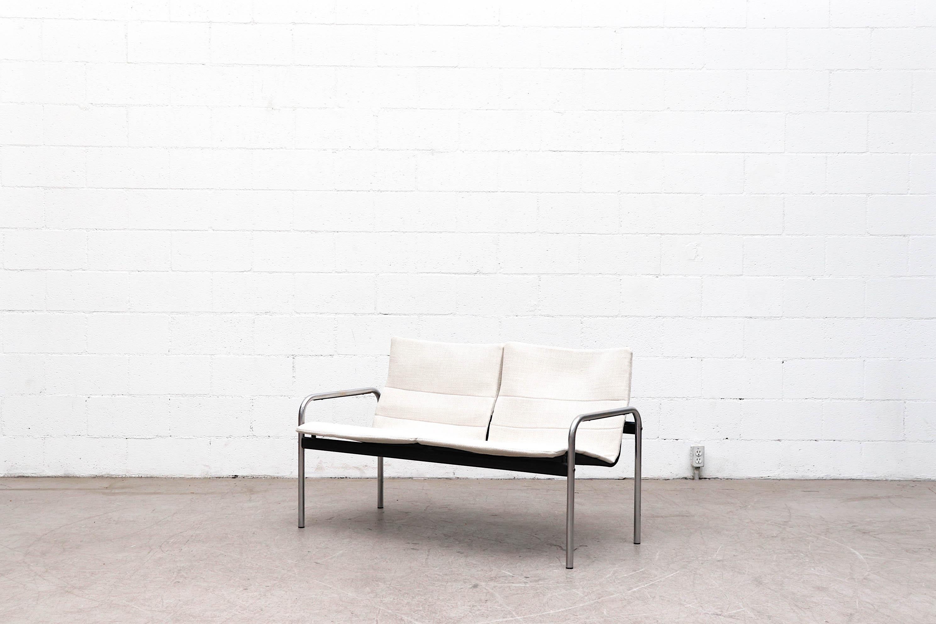 Ultrex series 2-seat loveseat by Just Meyer for Kembo, 1970s. Tubular chrome frame, canvas support and cornflower seat covers. Lowest sitting height is 13.5