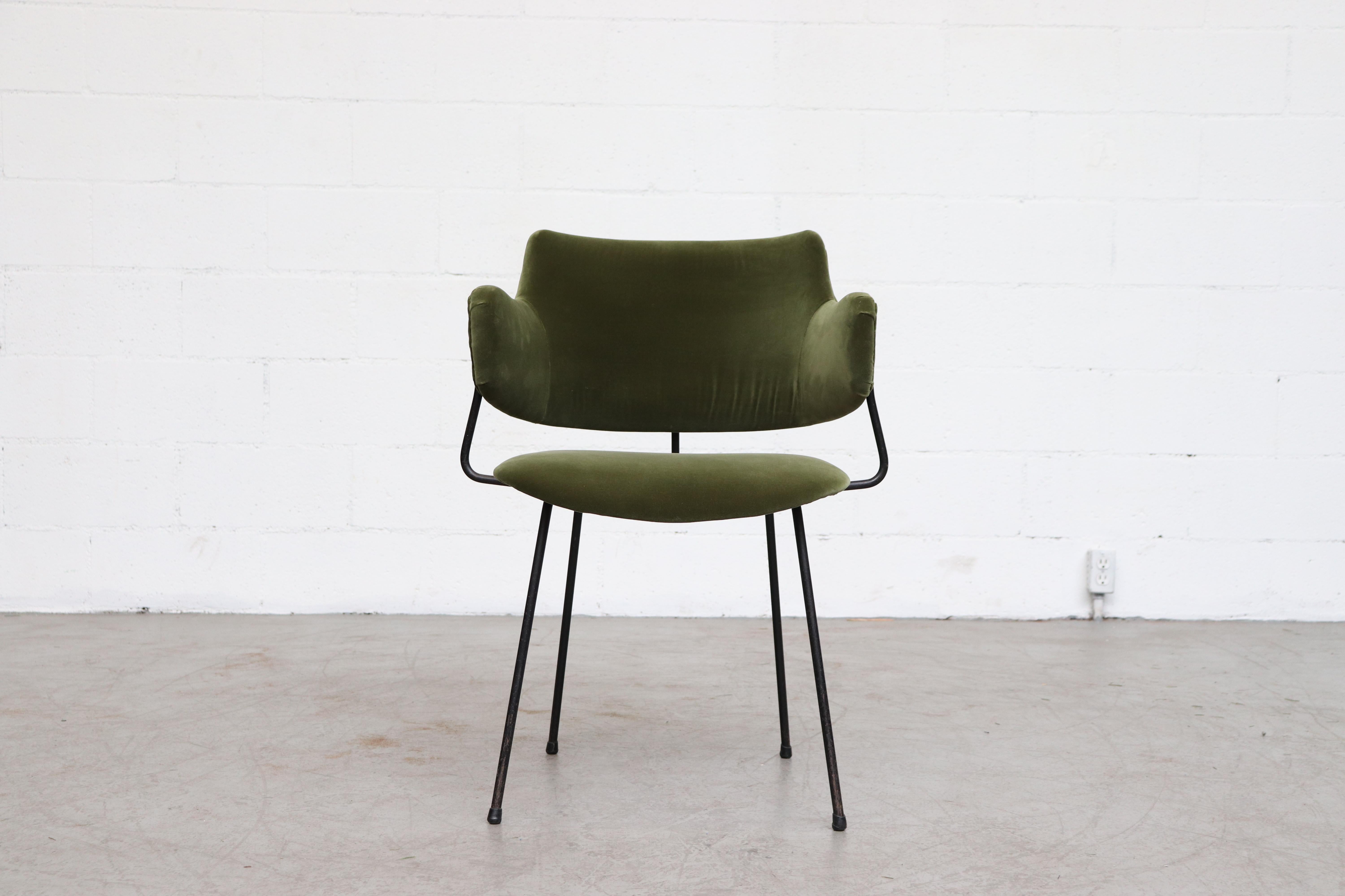 Kembo wire frame armchair. Newly upholstered in olive velvet. Black Wire frame and soft curved edges create a beautiful, distinct silhouette. Frame in original condition with visible signs of wear consistent with its age and use.