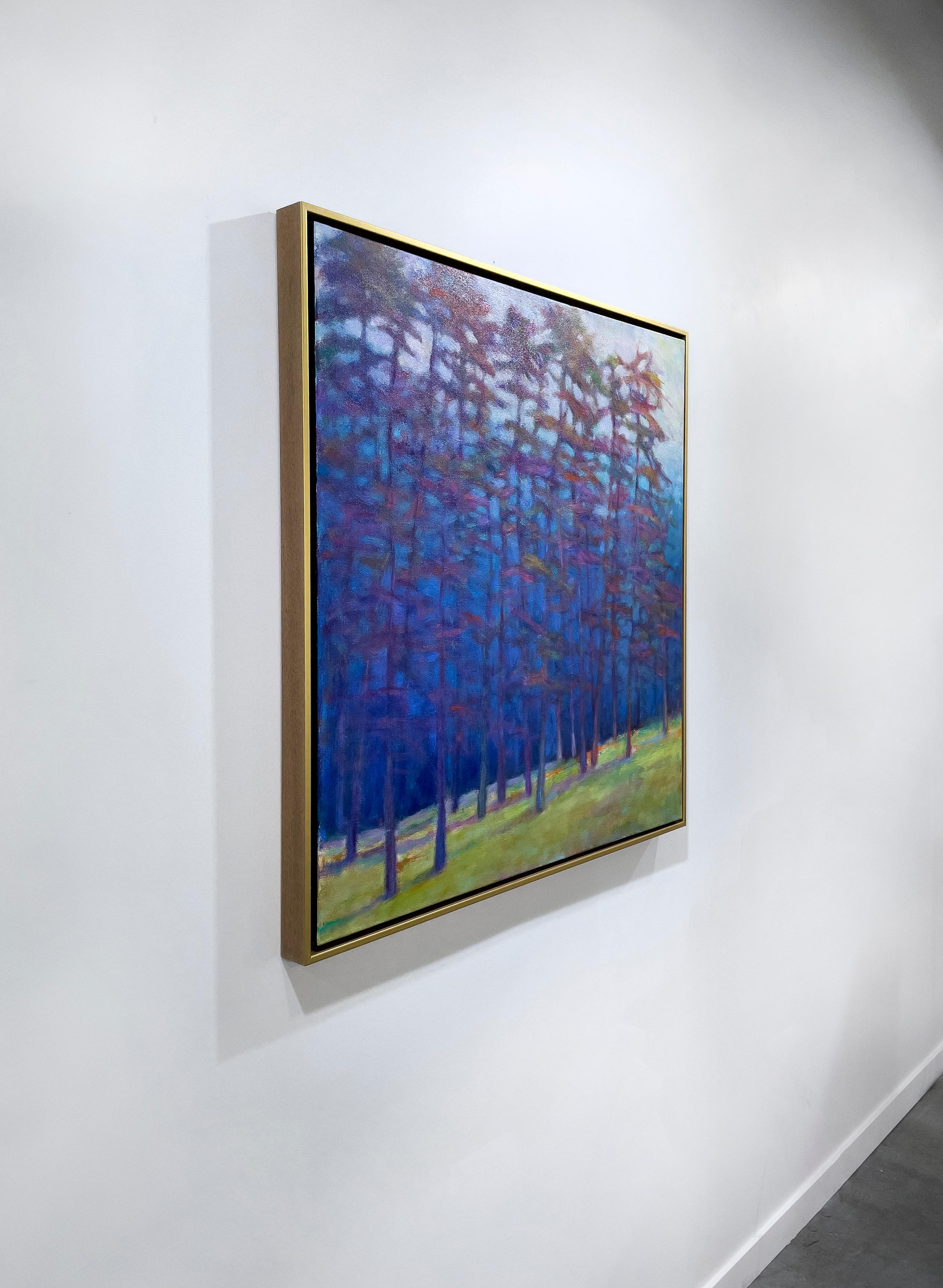 This contemporary abstract landscape painting by Ken Elliott is made with oil paint on canvas. It depicts an abstracted forest-scape, with cool blue and violet trees and a yellow-green forest floor. The cool blues are contrasted by light, saturated