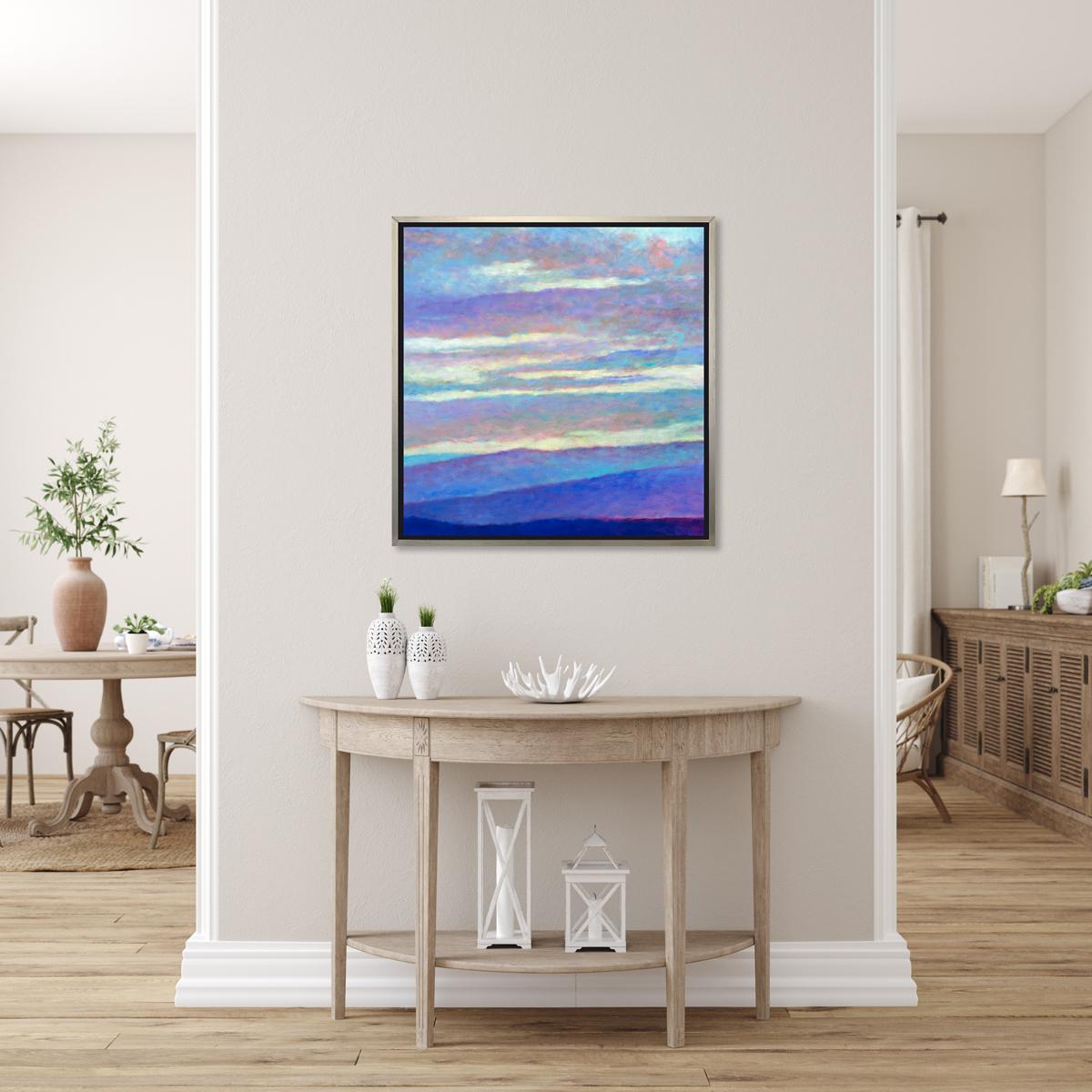 This abstract landscape limited edition print by Ken Elliott features a cool blue and violet palette, capturing hills underneath thick clouds, with contrasting accents of warm yellow peaking out throughout the sky. 

This Limited Edition giclee