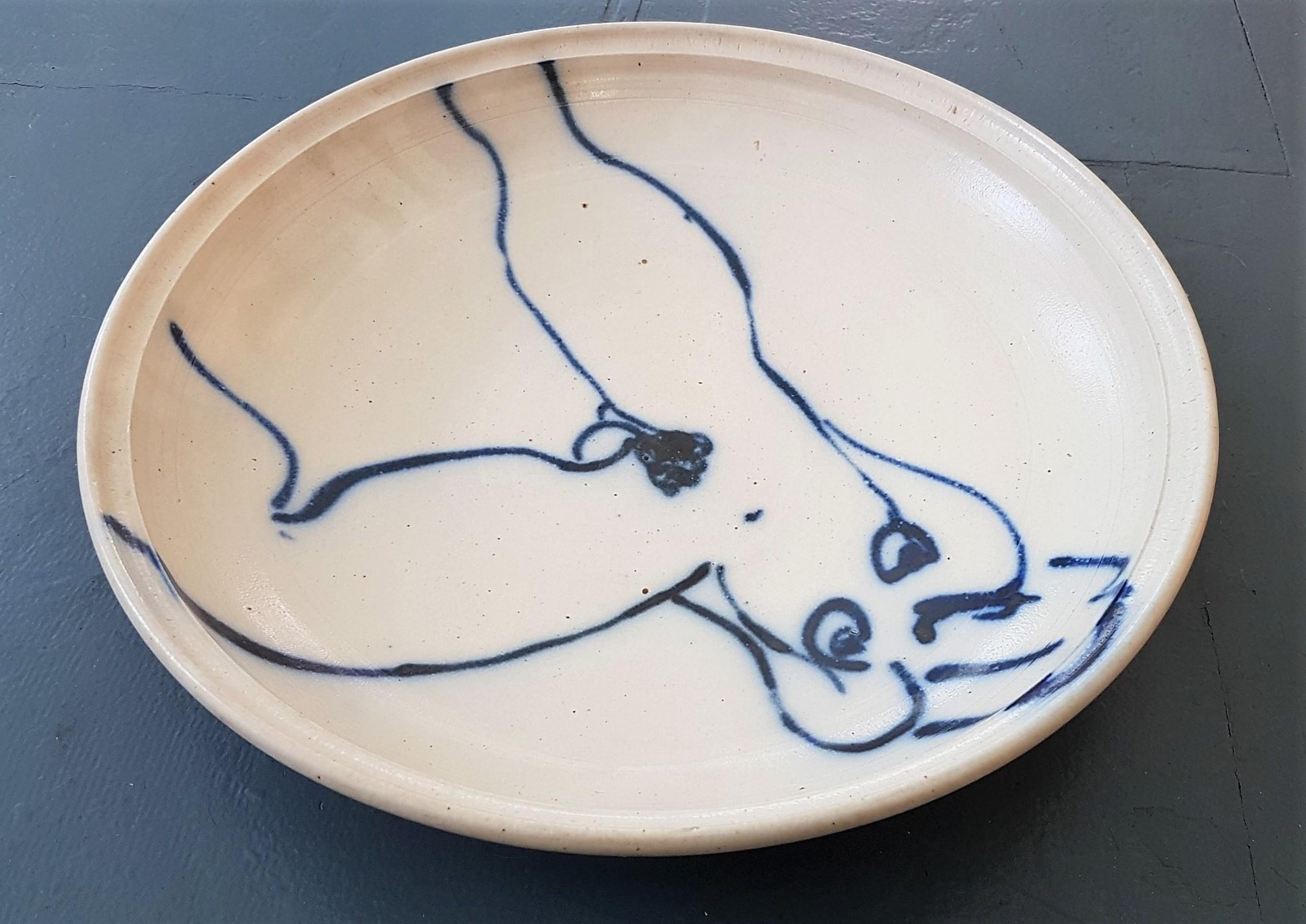 Ken Ferguson
Large Bowl with Nude
Wheel-thrown, salt-glazed stoneware
Year: Unknown
Size: 17.75 x 3 inches
Signed/Stamped
COA provided

Kenneth Richard Ferguson was born in 1928 in Elwood, Indiana. He received a Bachedlor of Fine Arts degree in