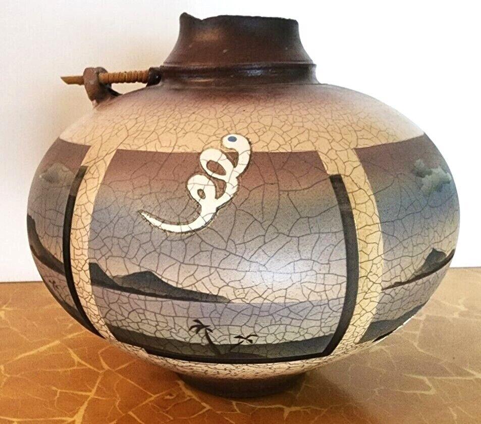 Offering one of our recent palm beach estate fine art acquisitions of a
Ken Jensen Pottery 1980 Native American style Raku vase vessel signed 

Approximate measurements in inches
9.5