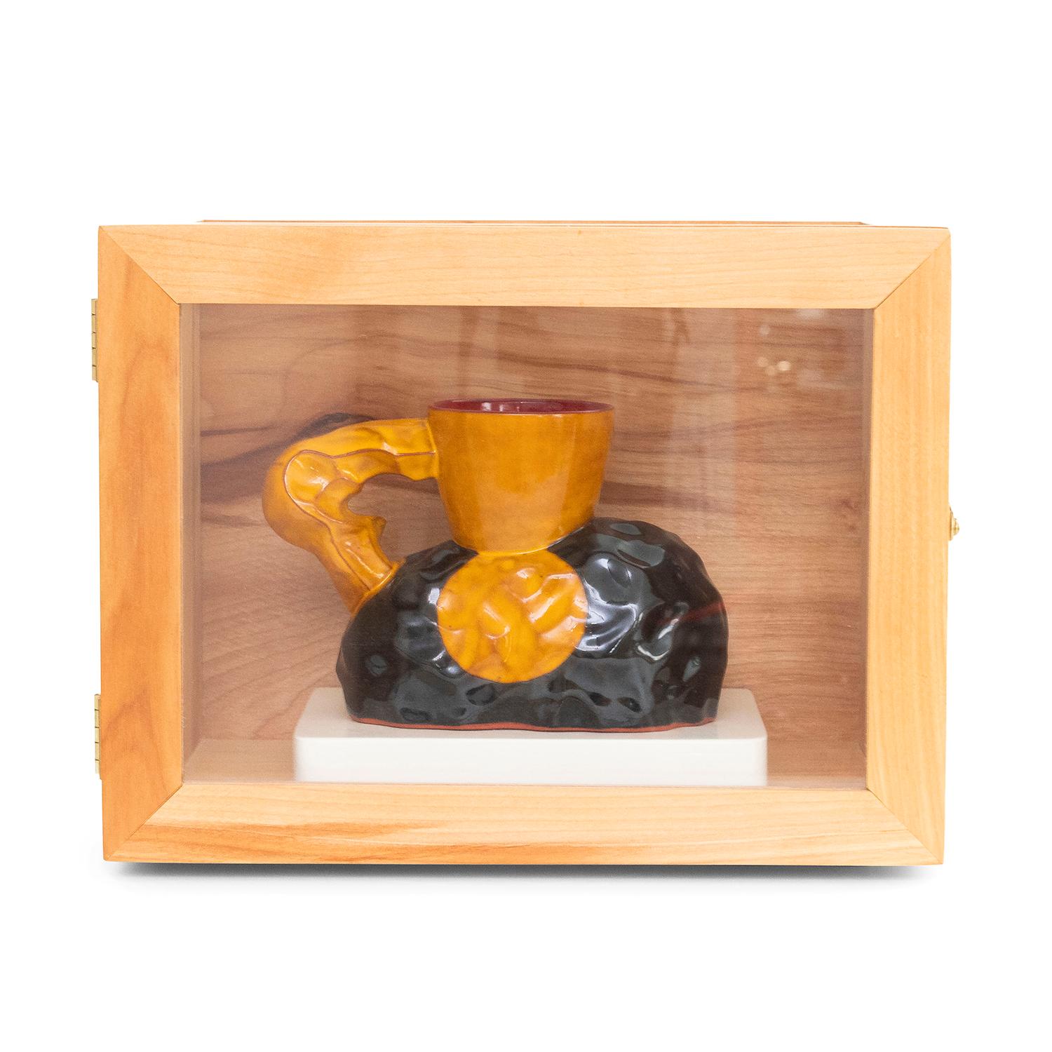 Ken Price 
California Cup (INV# NP5005)
glazed earthenware
cup: 4.19 x 6 x 3"
handmade wooden box: 8 x 10.38 x 5.63"
1991
#18/25
signed, dated, and numbered
provenance The Nevica Project
provenance Gemini GEL 

Ken Price (1935 - 2012) received a BFA