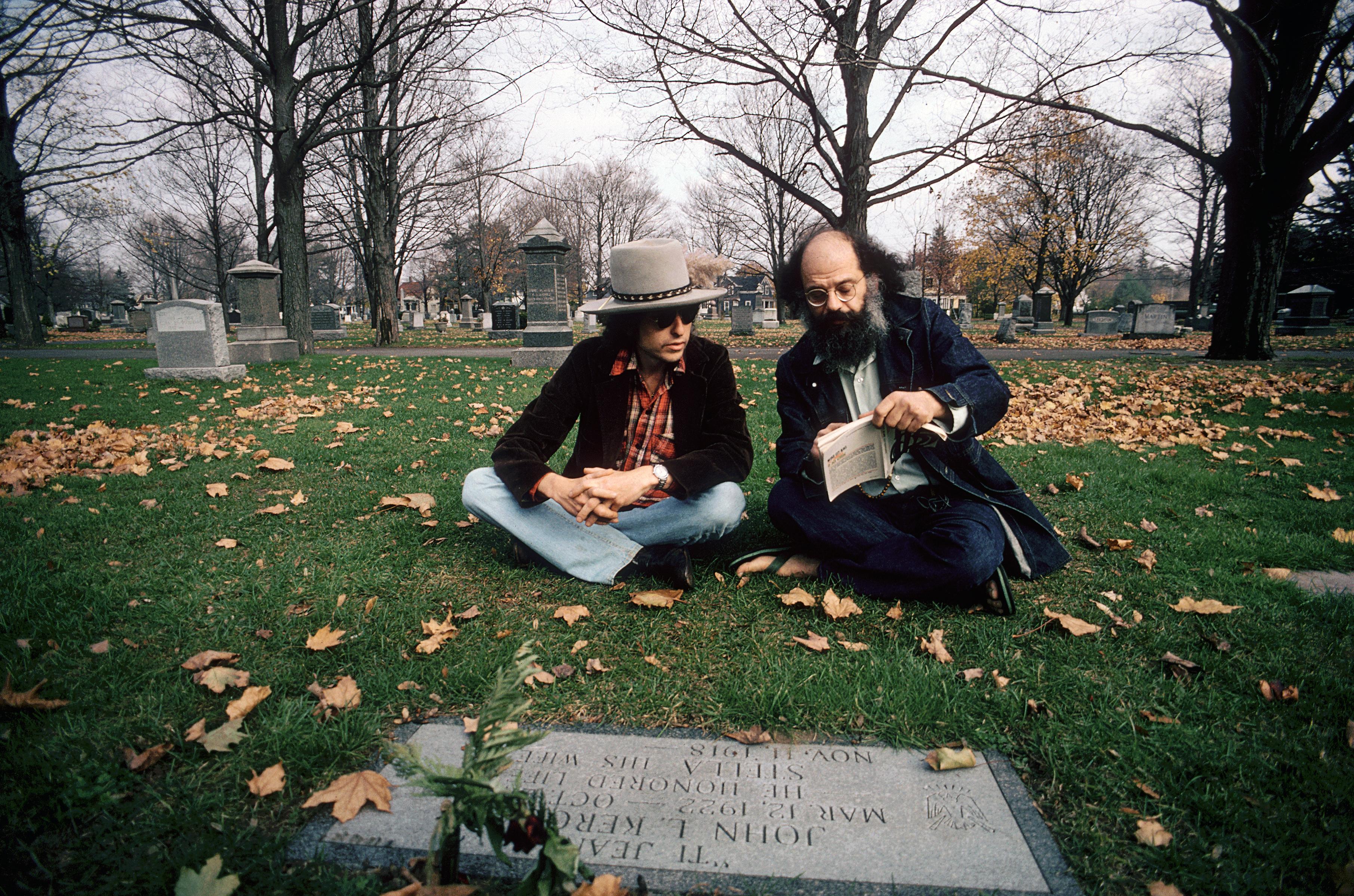 Ken Regan Color Photograph - Bob Dylan and Allen Ginsberg sitting at Jack(John L.) Kerouac's Grave