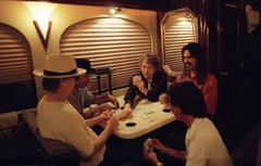 Bob Dylan and the band playing poker on the bus, 2001