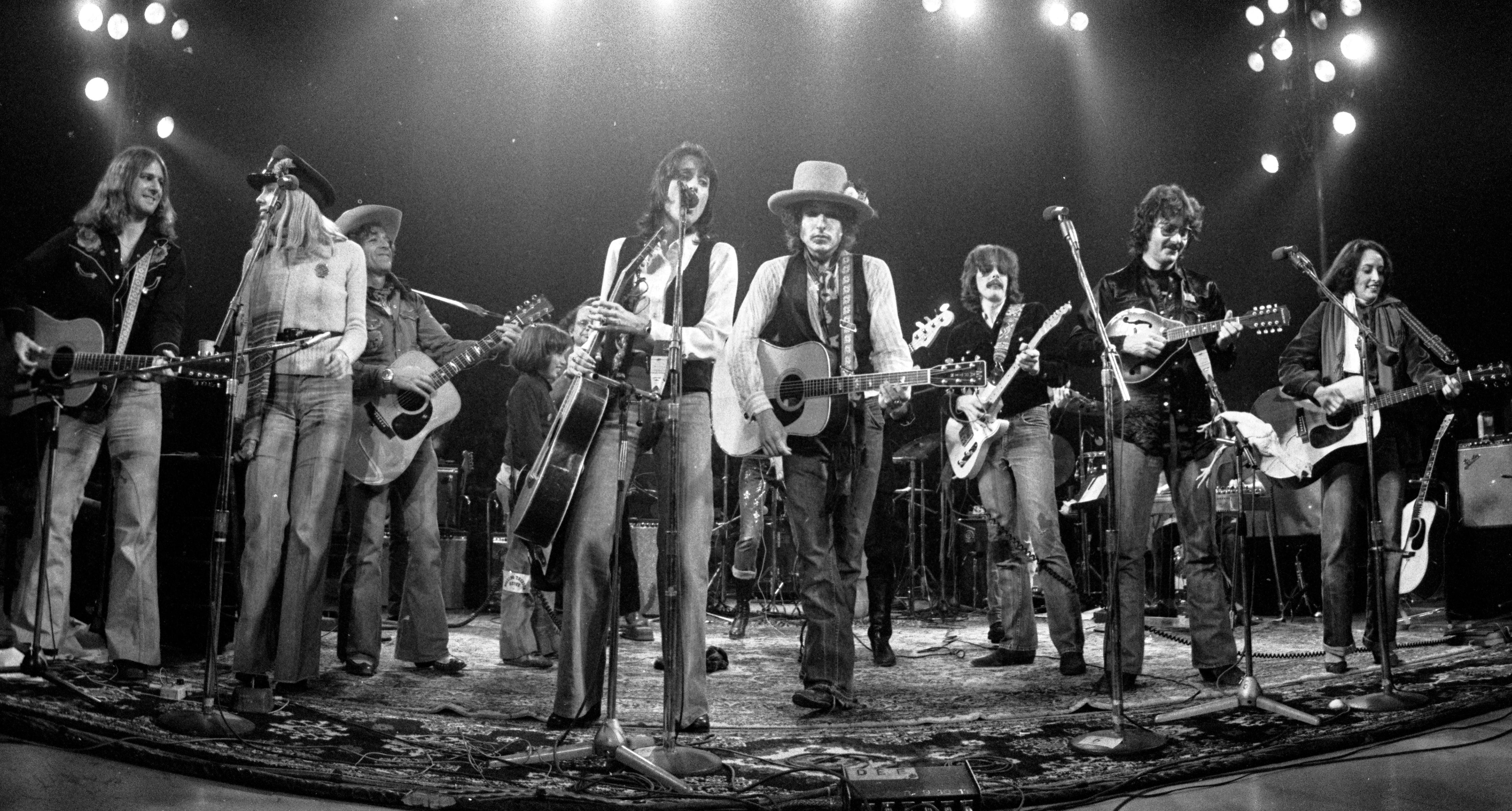 Ken Regan Black and White Photograph - Bob Dylan, Joan Baez and the Band on stage, Rolling Thunder Revue Tour, Montreal