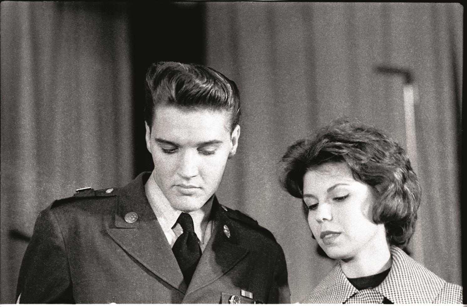 Ken Regan Black and White Photograph - Elvis Presley and Nancy Sinatra, Fort Dix, NJ
