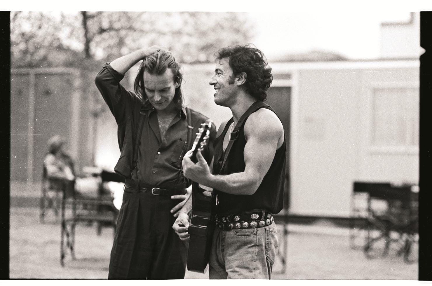 Ken Regan Portrait Photograph - Sting and Bruce Springsteen, Amnesty International, 1988