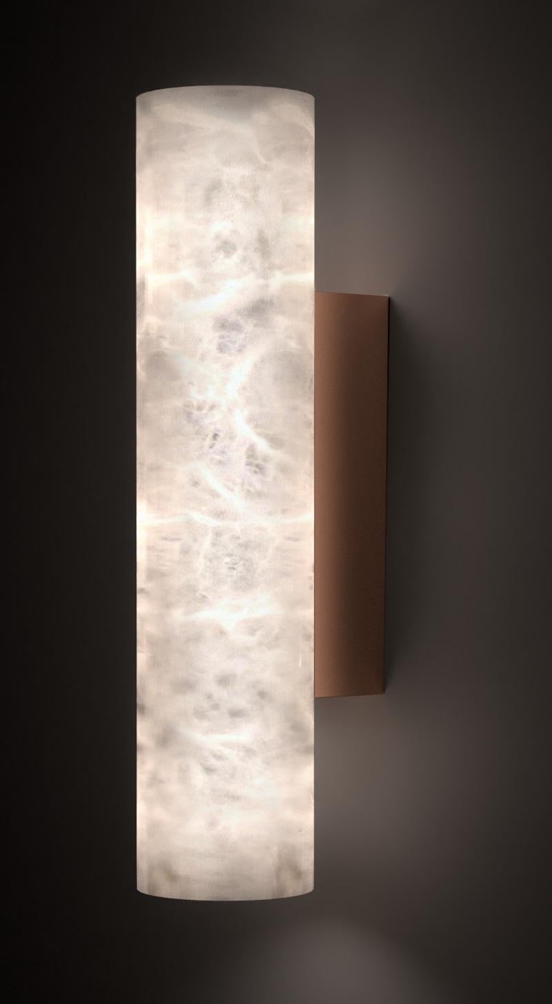 Kendō 1 Small Copper Applique by Alabastro Italiano
Dimensions: Ø 8 x H 30 cm.
Materials: White alabaster and copper.

Available in different finishes: Shiny Silver, Bronze, Brushed Brass, Ruggine of Florence, Brushed Burnished, Shiny Gold, Brushed