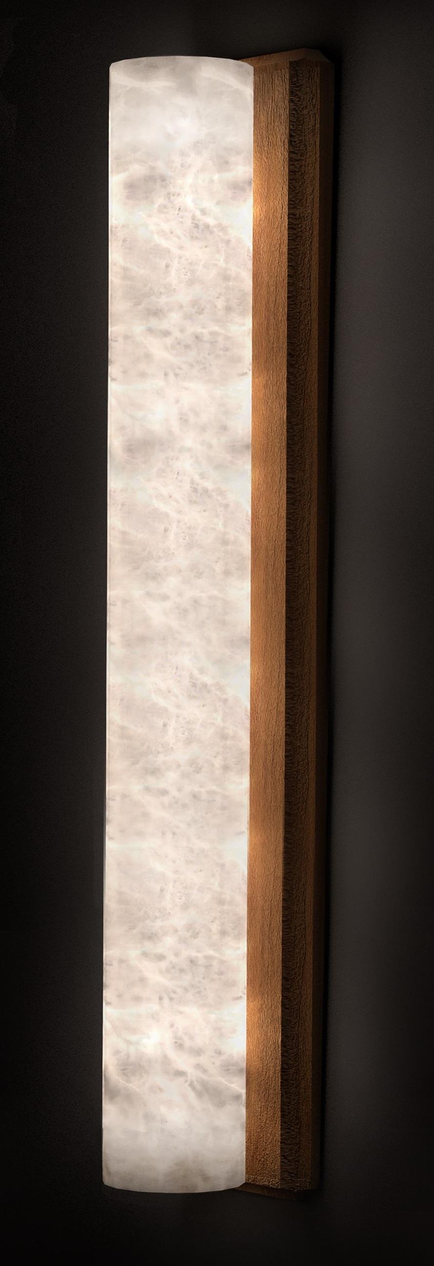 Kendō 2 Große Iroko Holzapplikation von Alabastro Italiano
Abmessungen: Ø 14 x H 74 cm.
MATERIALIEN: Weißer Alabaster und Iroko-Holz.

Erhältlich in verschiedenen Ausführungen: Iroko-Holz und Mattschwarz. Auch in verschiedenen Größen erhältlich.