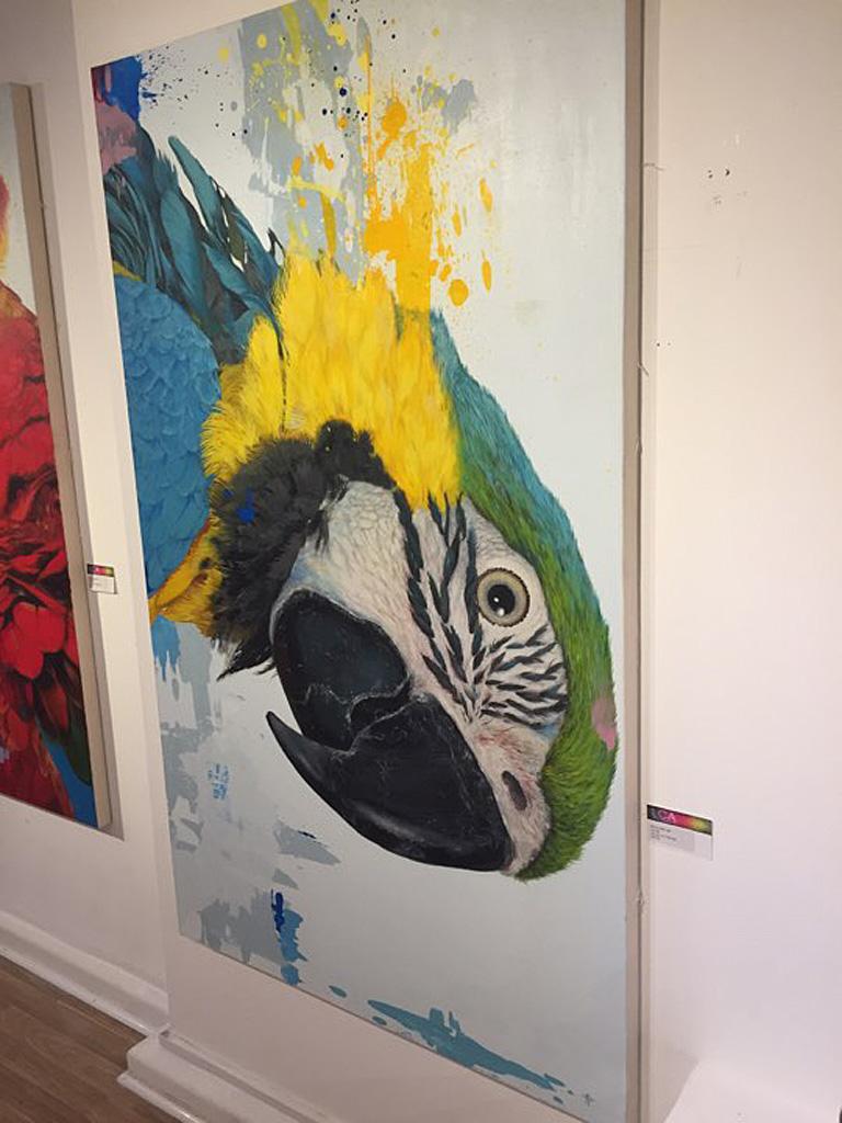 Louise - vibrant yellow and blue illustrative parrot painting acrylic canvas  - Painting by Keng Wai Lee
