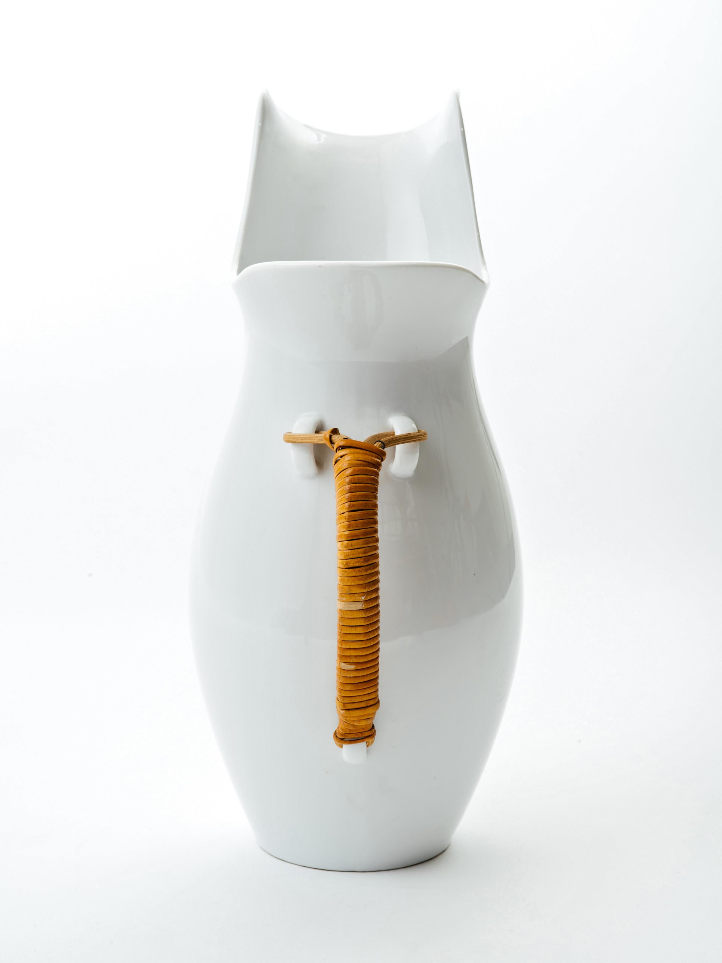 Uncommonly tall pitcher in glazed ceramic by Kenji Fujita for Freeman Lederman. Sensual, minimalist design, signed to the underside.