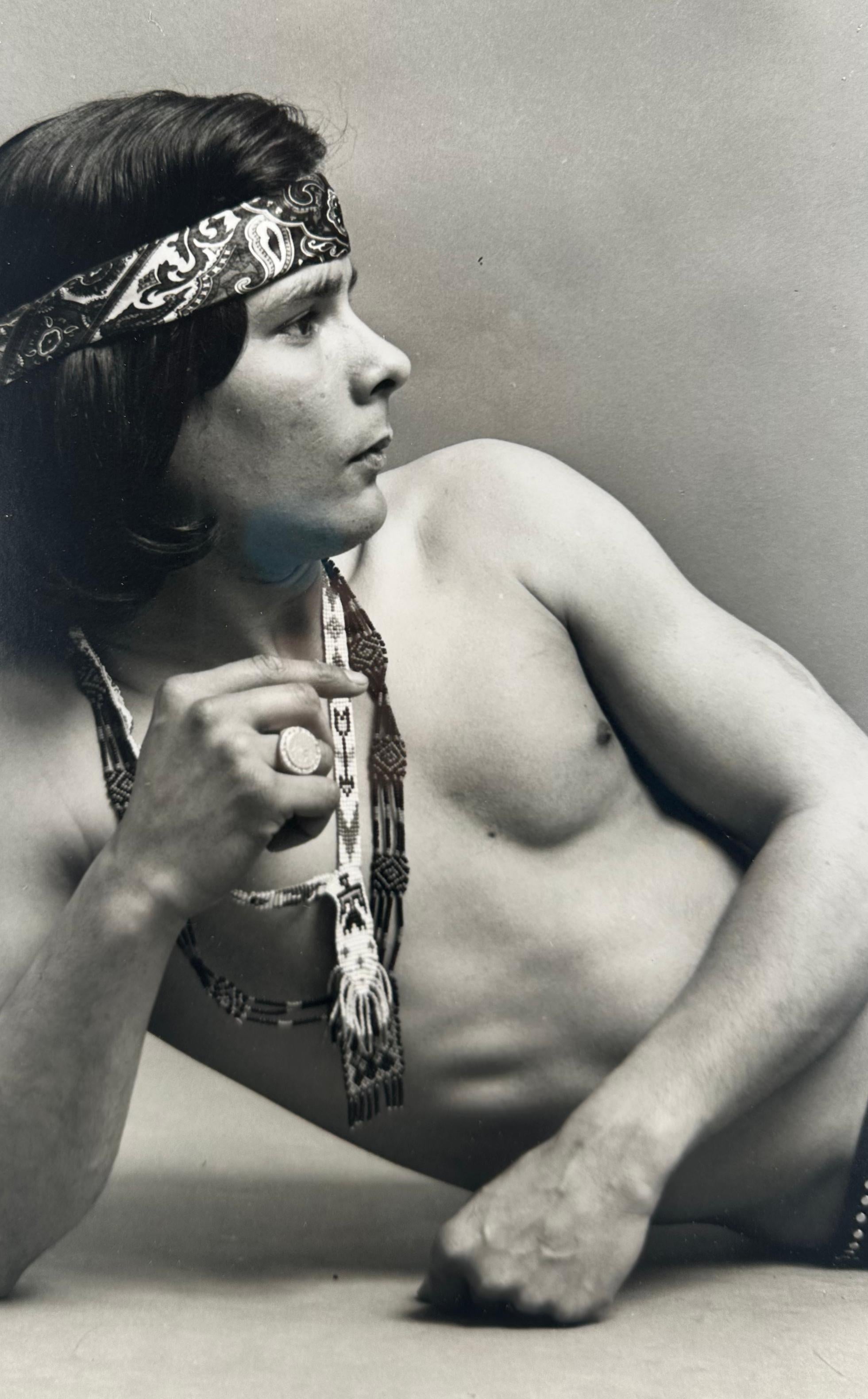 Portrait of Man in Headband - Photograph by Kenn Duncan