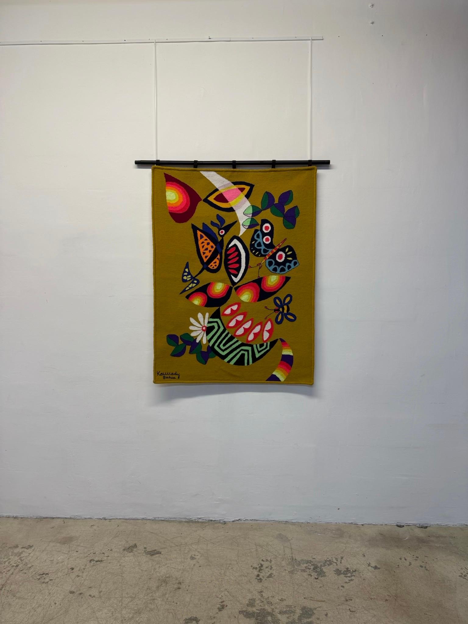 Woven wall tapestry by Brazilian textile artist Kennedy Bahia circa 1980.  

Hummingbird, butterflies and flowers.

“Known nationally and internationally, Kennedy Bahia was one of the pioneers in the expansion of the plastic arts in the State and