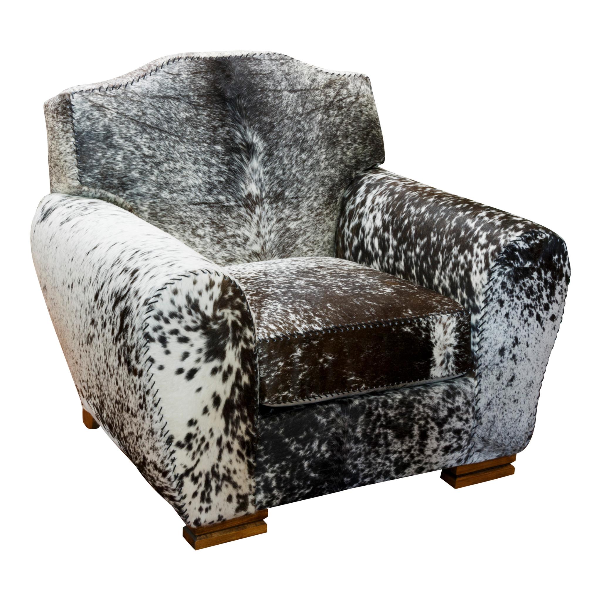 Kennedy collection black speckled great room chair with brown spot on back, of long-Horn hide with matching ottoman, seams buck stitched. Can choose customizable designs with leathers, wood and hides. Made to order so please allow time for
