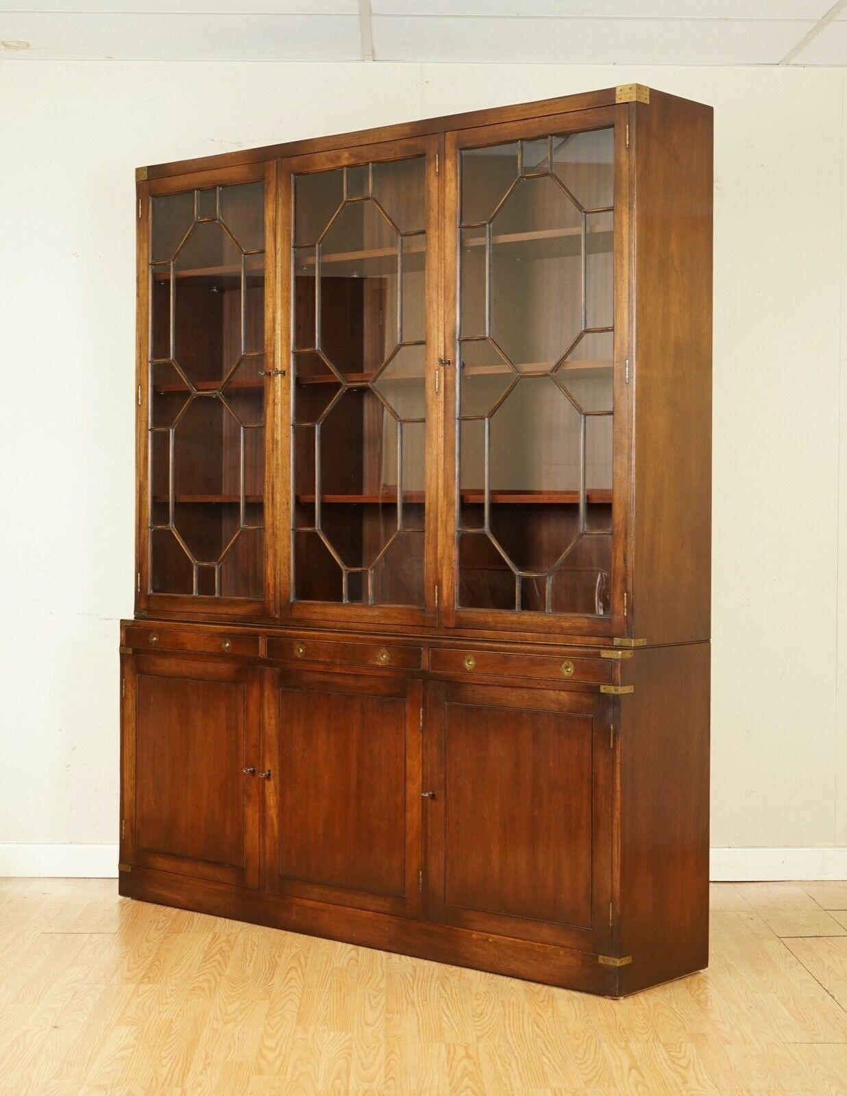 We are so excited to present to you this Outstanding Kennedy Furniture for Harrods London Campaign Library Bookcase.

A very good looking well-made and decorative bookcase. 

Retailed through Harrods London, it’s made in the Military Campaign