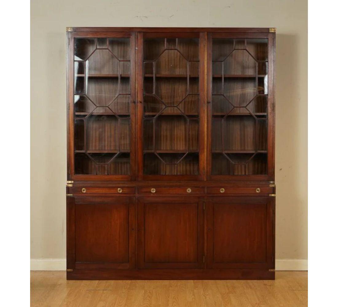 We are delighted to offer for sale this outstanding Kennedy furniture for Harrods London Campaign library bookcase.

A very good-looking, well-made and decorative bookcase. Retailed through Harrods London, it’s made in the military campaign style,