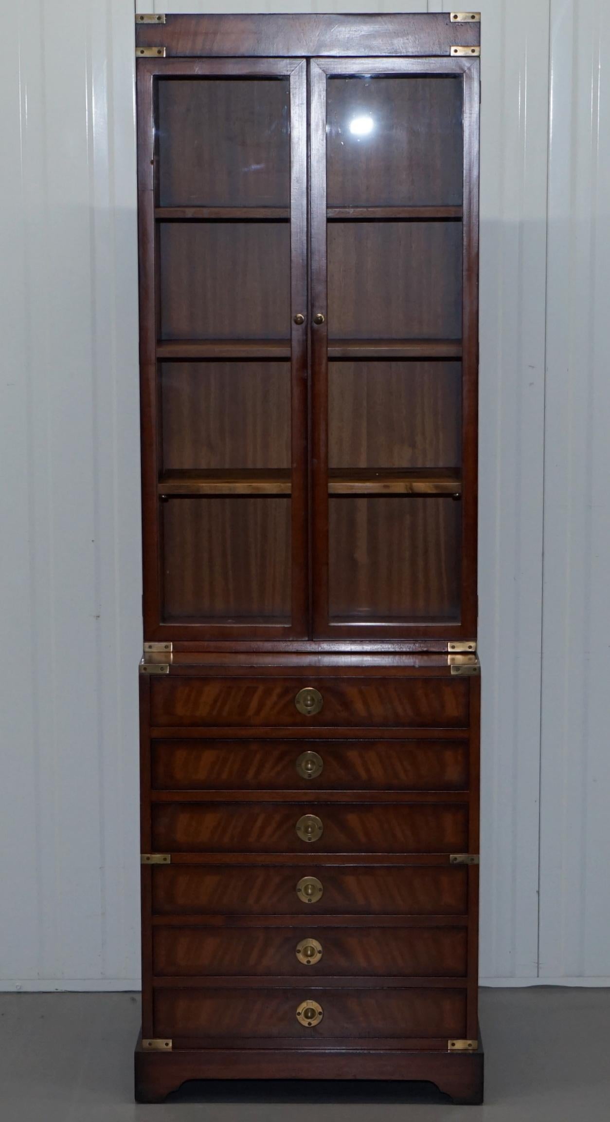 We are delighted to offer for sale this stunning RRP £6500 Kennedy furniture hand made in England and retails through Harrods London Military campaign bookcase with drawers

A very good looking solid and well made piece, ideally suited for a