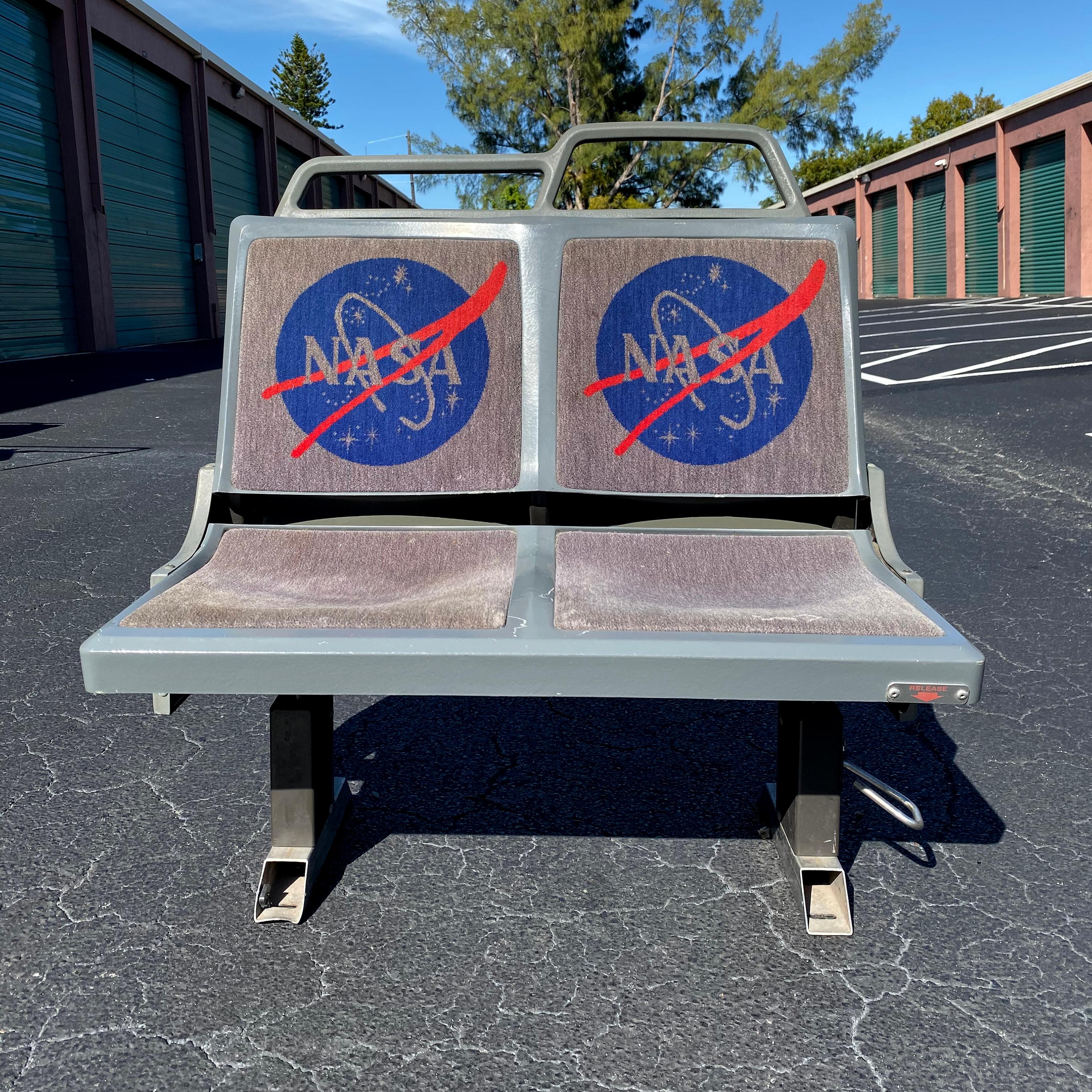 Vintage salvaged Nasa seats from the Kennedy Space Center Visitor Complex shuttle tour bus in Merritt Island FL. These are a rare find with the original upholstered Nasa logo backrests and were made with the ability to fold up for space if needed.